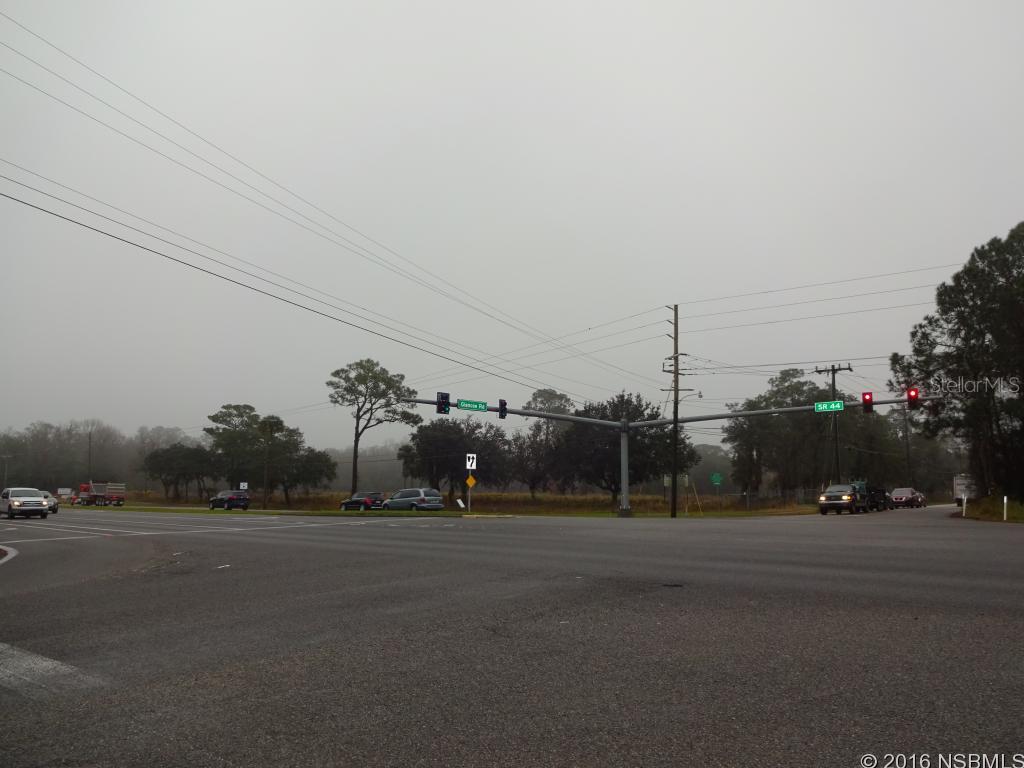 High visibility corner at traffic control light, rights to interior private road to be constructed, Lot prepared for use, common access entryway and deceleration lane on Highway 44, off site storm water retention provided, Lot 2 adjoining this Lot to the east under contract for Convenience Store with fuel supply, Lot grade, water, sewer, electric supplied to Lot. Listing Agent is C0-Manager of Dal-Ter Properties, LLC, Property Owner; Cleared: Partial ;Water: Available at Site