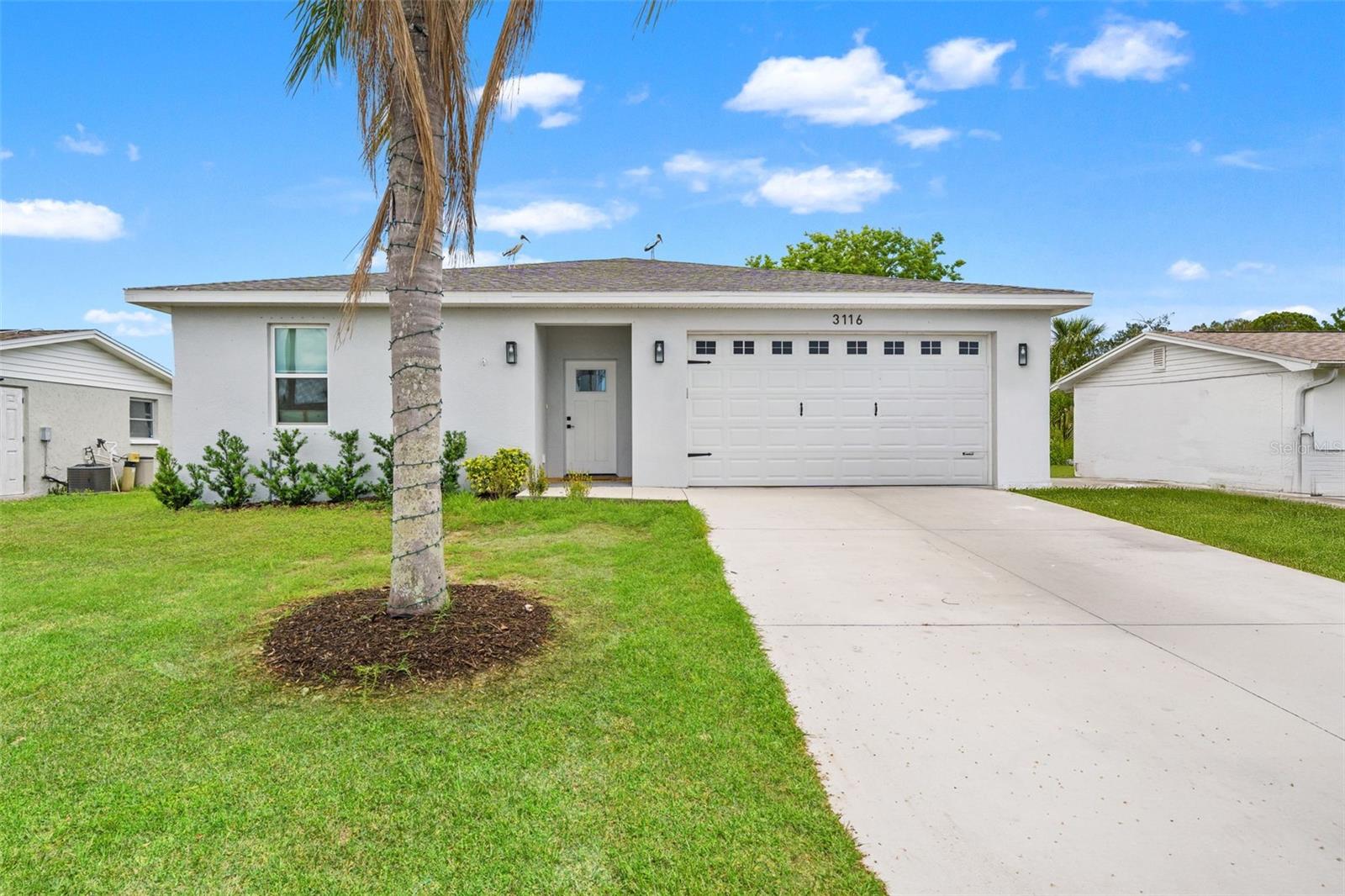 Built in 2024, this beautifully designed 3 bedroom, 2 bathroom home in Holiday Lake Estates features an open floor plan with modern finishes and a relaxing back porch perfect for enjoying the Florida lifestyle plus no CDD or HOA fees! Conveniently located near Downtown New Port Richey, shopping, dining, parks, and entertainment, while also close to Key Vista Nature Park for scenic walking trails and outdoor activities. Schedule your showing today!