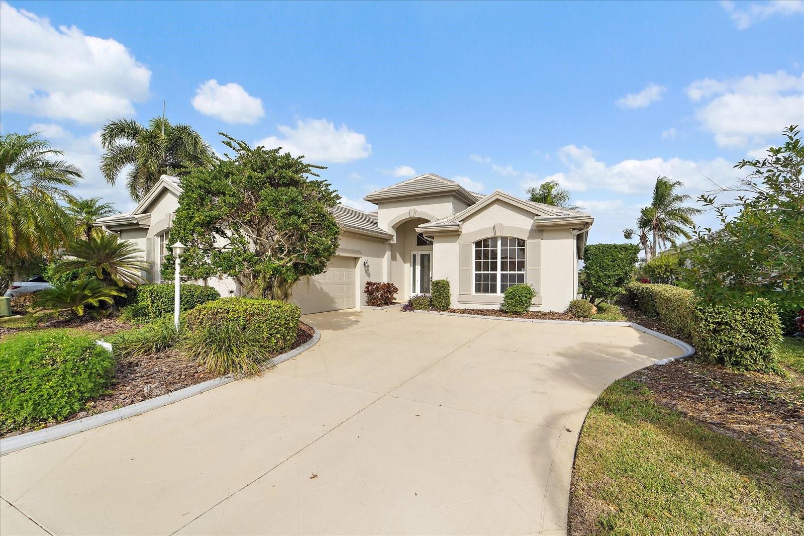 *One or more photos has been virtually staged* Welcome to a truly special offering in sought after, gated Edgewater Village—an elegant Arthur Rutenberg–built waterfront home perfectly positioned on a premier lot overlooking the serene 153-acre Lake Uhlein. With long, tranquil water views enjoyed from the pool, lanai, kitchen, great room, and primary suite, this home delivers the rare combination of luxury, privacy, and everyday livability.

Thoughtfully updated, the home features a new roof (2024), resurfaced pool (2023), redone deeded dock (2023, shared with neighboring property), and HVAC replaced in 2021. Fresh interior and exterior paint, new flooring, updated baths with new toilets, an updated kitchen with new stainless steel appliances, and countless additional improvements make this home truly move-in ready.

Enter through elegant double glass doors into a welcoming foyer with a tray ceiling, opening to a bright, open great room with soaring ceilings, tall doors, crown molding, and a wall of custom built-ins accented by a large mirror. Expansive sliding glass doors seamlessly connect indoor living to the screened lanai and pool, creating an ideal space for entertaining or simply enjoying the peaceful lake backdrop.

The formal dining room impresses with a double tray ceiling, crown molding, and a statement chandelier, while the kitchen offers crisp white cabinetry, a center island, new stainless appliances, and a cozy dinette framed by bayed glass windows overlooking the pool and water beyond.

The primary suite is a private retreat featuring stunning lake views, a double tray ceiling, and a custom-organized walk-in closet. The ensuite bath includes dual vanities with new white granite countertops, a soaking garden tub, and a separate walk-in shower. Two additional bedrooms, a den/office, two full baths plus a half bath, and a well-appointed utility room with cabinetry and a utility tub complete the interior.

Additional highlights include newly painted garage walls and floors, a double storage closet in the garage, Bermuda shutters, and a bright, pet-friendly layout designed for Florida living.

Edgewater Village residents enjoy access to a community boat ramp, kayak storage, fishing pier, and miles of scenic surroundings. Ideally located on University Parkway, just minutes to Waterside, Lakewood Ranch Main Street, UTC Mall, golf courses, medical facilities, and A-rated schools. SRQ Airport and downtown Sarasota are approximately 20 minutes away, offering world-class dining, arts, and beaches.

Located in Lakewood Ranch—voted the #1 multigenerational community in the U.S.—this exceptional waterfront home truly embodies the best of the Florida lifestyle.