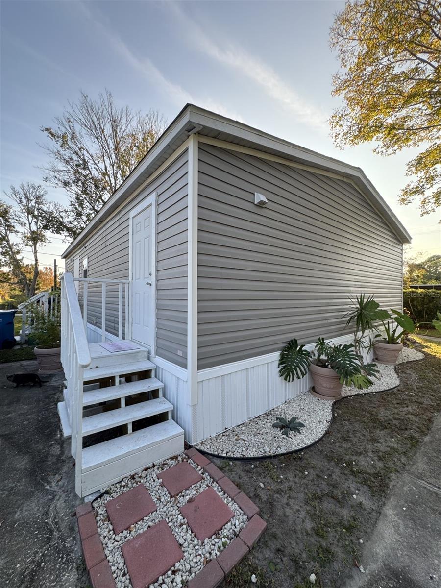 Charming Corner-Lot Home – 3 Beds, 2 Baths, Move-In Ready!! 
Call today and don't miss this incredible opportunity to own a beautiful home at one of the best prices in the area! The seller is offering a $5,000 credit toward the buyer's closing costs, providing a fantastic opportunity to reduce your out-of-pocket expenses. Welcome to this beautifully maintained corner-lot home featuring 3 spacious bedrooms and 2 full bathrooms, ready for immediate move-in. Best of all, the land is included with the property—no lot lease fees and no HOA, giving you added freedom and peace of mind. Step inside to discover a bright and inviting kitchen, along with comfortable living spaces that are perfect for both everyday living and entertaining. Relax on the charming front porch, where gentle breezes, mature trees, and birdsong create a peaceful setting for your morning coffee or evening unwinding.
The fully fenced yard offers plenty of space and feels even larger than expected. The property also features a driveway with room for 3–4 vehicles. The generous backyard is ideal for family barbecues, outdoor gatherings, pets, or simply enjoying Florida's beautiful sunsets.
Conveniently located near pristine beaches, shopping centers, top-rated hospitals, Daytona Beach, and Disney attractions, this home offers the perfect combination of comfort, convenience, and lifestyle.
Don't let this opportunity pass you by. Schedule your private showing today and make this wonderful property your new home!