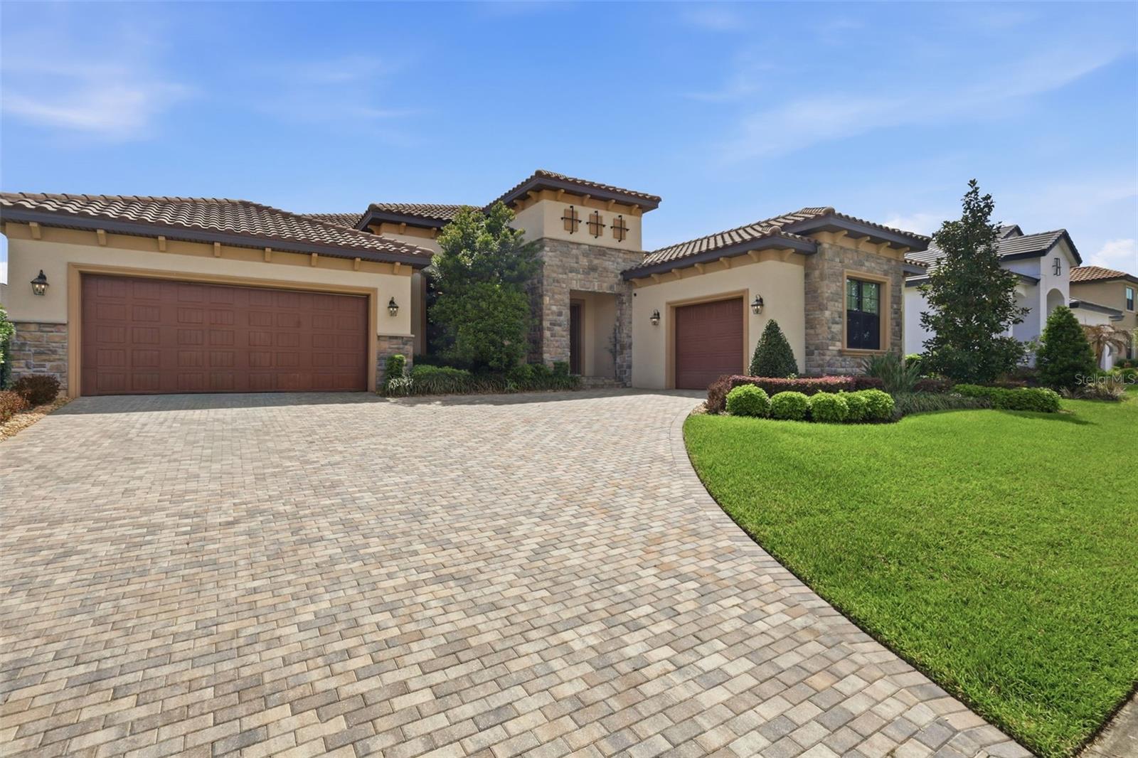 Welcome to 14907 Tavares Mill-an exceptional residence where refined design meets effortless Florida luxury.  Perfectly positioned in the highly sought-after community of The Preserve in Fishhawk Ranch, this home offers a seamless blend of elegance, comfort and modern sophistication.  From the moment you arrive, the home's striking curb appeal and architectural detail set the tone for what lies within.  Step inside to discover a thoughtfully curated open-concept floor plan, enhanced by soaring ceilings, abundant natural light and designer finishes throughout.  Every space has been crafted with both style and function in mind, creating an ideal setting for elevated everyday living and upscale entertaining.  The gourmet kitchen serves as the heart of the home, featuring premium appliances, expansive countertops, custom cabinetry and a center island that flows effortlessly into the main living and dining areas-perfect for hosting gatherings or enjoying intimate evenings at home, whether by the pool or fireplace.  The primary suite is a true private retreat, offering a serene atmosphere and a spacious walk-in closet.  Additional bedrooms provide comfort and versatility ideal for guests or family.  Step outside to your own private oasis, where indoor-outdoor living comes to life.  Whether you're entertaining, enjoying peaceful mornings or relaxing by the pool OR in the spa, welcome home.  Ideally located near shopping, dining and top-rated schools, this home delivers both convenience and exclusivity.. This is more than a home-it's a statement!  Schedule your private tour today and experience the lifestyle you deserve.