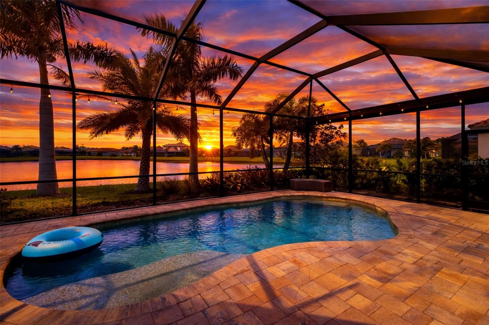 ROSEDALE GOLF & COUNTRY CLUB | CHAMPIONSHIP GOLF | LAKEVIEW SALTWATER POOL HOME | WEST-FACING SUNSET LOT | 3 BED + OFFICE/DEN | 2.5 BATH
What if your everyday started on the golf course, with a set of tennis after, an afternoon by the pool, and dinner at the outdoor bistro? At 10107 Carnoustie Pl, all of that lives at one address.
Come home to a saltwater pool, an extended lanai with alfresco dining, and a premium west-facing lot that looks across the lake straight into the sunset. Inside, the home has been finished with real care and personality. Think a library wall with a rolling ladder, an office with a full built-in wall system and a queen Murphy bed, a custom entertainment center, and a pantry done up with its own countertop, shelving, and spice racks. You get three bedrooms plus a separate office/den, 2.5 baths, and an extended three-car tandem garage with added depth for larger vehicles, plus a motorized lanai screen for easy indoor-outdoor living.
All of it sits in Rosedale Golf & Country Club, a gated community with two manned guard gates, a championship course, tennis, two pools, a fitness center, dog parks, and a clubhouse with dining. With no CDD fees and landscaping included, the lifestyle here is truly low-maintenance.
Homes with this view and these upgrades don't last. Reach out anytime and I'll set up your private showing.