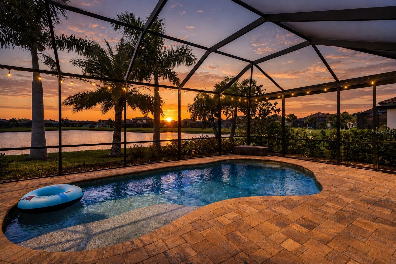 ROSEDALE GOLF & COUNTRY CLUB | CHAMPIONSHIP GOLF | LAKEVIEW SALTWATER POOL HOME | WEST-FACING SUNSET LOT | 3 BED + OFFICE/DEN | 2.5 BATH
What if your everyday started on the golf course, with a set of tennis after, an afternoon by the pool, and dinner at the outdoor bistro? At 10107 Carnoustie Pl, all of that lives at one address.
Come home to a saltwater pool, an extended lanai with alfresco dining, and a premium west-facing lot that looks across the lake straight into the sunset. Inside, the home has been finished with real care and personality. Think a library wall with a rolling ladder, an office with a full built-in wall system and a queen Murphy bed, a custom entertainment center, and a pantry done up with its own countertop, shelving, and spice racks. You get three bedrooms plus a separate office/den, 2.5 baths, and an extended three-car tandem garage with added depth for larger vehicles, plus a motorized lanai screen for easy indoor-outdoor living.
All of it sits in Rosedale Golf & Country Club, a gated community with two manned guard gates, a championship course, tennis, two pools, a fitness center, dog parks, and a clubhouse with dining. With no CDD fees and landscaping included, the lifestyle here is truly low-maintenance.
Homes with this view and these upgrades don't last. Reach out anytime and I'll set up your private showing.