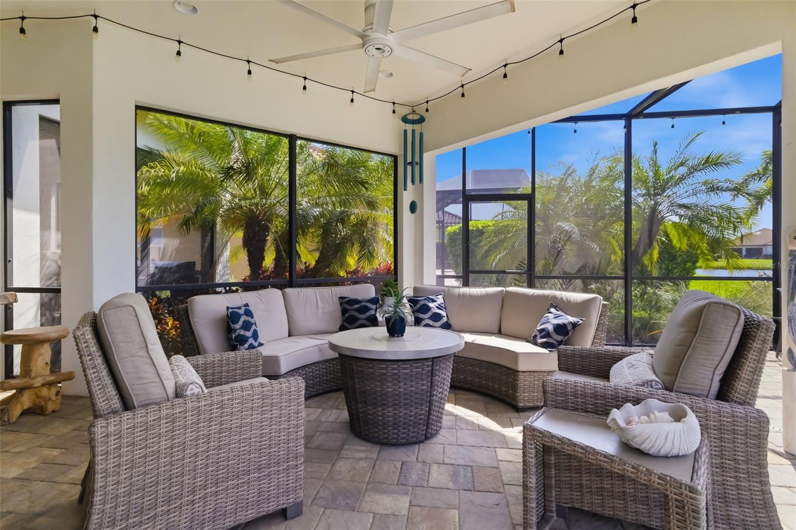 LIVE THE ROSEDALE COUNTRY CLUB LIFESTYLE in this beautifully maintained LAKEVIEW pool home, perfectly positioned on a PREMIUM WEST-FACING LOT for stunning sunset views. Offering 3 BEDROOMS + OFFICE/DEN, 2.5 BATHS, and an EXTENDED 3-CAR TANDEM GARAGE designed with added depth for larger vehicles, this home blends builder-selected upgrades with extensive homeowner improvements added after purchase. The sellers invested thoughtfully throughout the home, creating elevated function, storage, and style in nearly every space. BUILDER UPGRADES include the premium lake lot, extended tandem garage with extra overhead lighting, expanded laundry room with additional lighting, custom can lighting in the primary closet, kitchen bonus wall/cabinetry for an extra refrigerator, electrical and HVAC ventilation in the kitchen pantry, and an EXTENDED ROOFED LANAI/CASITA with extra outlets and outdoor shower. After purchase, the homeowners added even more value with PROFESSIONAL LANDSCAPING, LANDSCAPE LIGHTING, professionally edged flower beds, GARAGE OVERHEAD STORAGE, custom laundry room shelving, overhead storage, and an oversized laundry sink ideal for pets. Inside, you’ll love the CUSTOM MUDROOM BENCH with storage and shelving, a CUSTOM ENTERTAINMENT CENTER WALL with overhead lighting, a beautifully finished KITCHEN PANTRY with custom countertop, shelving, and spice racks, plus custom shelving and clothing racks in the primary closet. Additional homeowner upgrades include custom wood shelving in the primary bath linen closet, floating shelves in the water closet, a MOTORIZED PRIVACY SCREEN and oversized specialty fan on the lanai, a LIBRARY WALL WITH ROLLING LADDER, and an OFFICE WALL SYSTEM with desk, shelving, and built-in QUEEN-SIZE MURPHY BED. Enjoy seamless indoor-outdoor living with a PRIVATE SALTWATER POOL, EXTENDED LANAI, and dedicated ALFRESCO DINING AREA designed for relaxing or entertaining. Located in the gated community of ROSEDALE GOLF & COUNTRY CLUB, residents enjoy access to a CHAMPIONSHIP GOLF COURSE, TENNIS, COMMUNITY POOL, JUNIOR OLYMPIC-SIZE POOL, FITNESS AND WELLNESS CENTER, and a CLUBHOUSE with DINING, LOUNGE, and OUTDOOR BISTRO PATIO. With TWO MANNED GUARD GATES, NO CDD FEES, LANDSCAPING INCLUDED, DOG PARKS, and TRUE LOW-MAINTENANCE LIVING, this home offers the best of comfort, upgrades, and lifestyle. Schedule your private showing today!