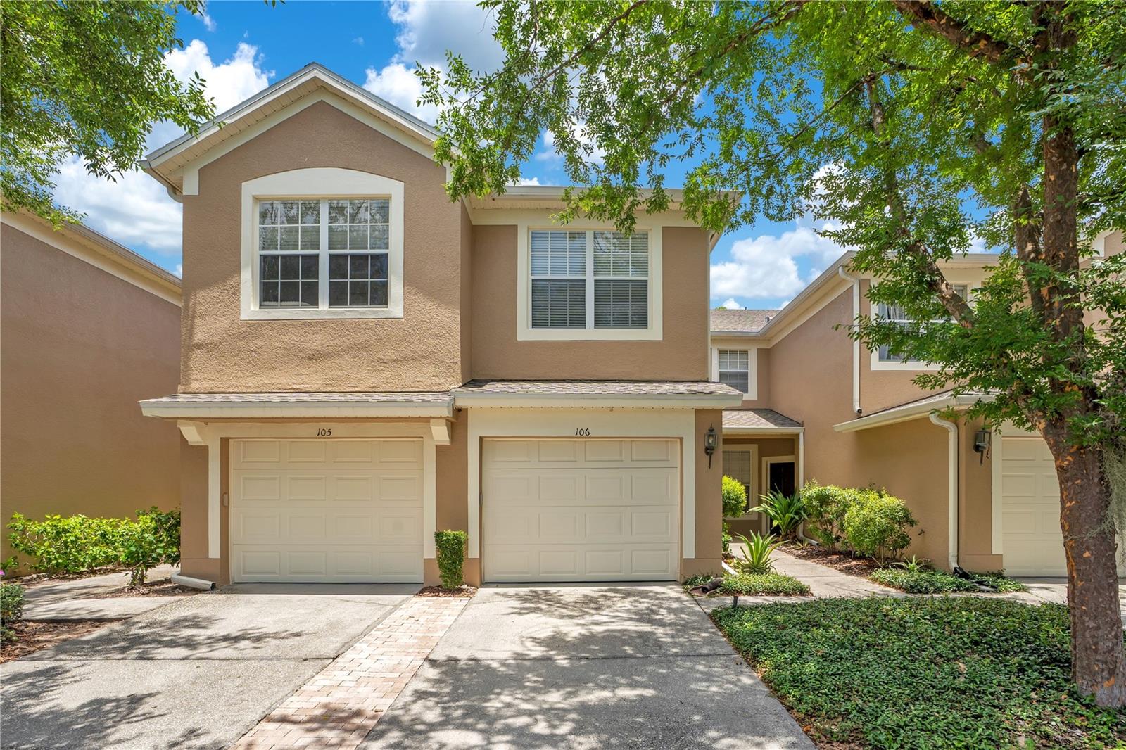 Located in the desirable, guard-gated community of Stonebridge Commons, this exceptionally maintained first-floor carriage home offers 3 bedrooms, 2 bathrooms, peaceful water views, and a prime location just steps from the clubhouse and resort-style amenities. With more than $50,000 in bathroom renovations, soundproof New South windows (2021), updated mechanical systems, and an attached one-car garage, the home combines everyday comfort with move-in-ready convenience.

The bright, open floor plan features soaring ceilings, abundant natural light, plantation shutters, and like-new ceramic tile flooring throughout, with no carpet anywhere in the home. Large windows frame tranquil views of the pond, a mature shade tree, and local wildlife—including blue herons, otters, and turtles—which can also be enjoyed from the screened and covered lanai. A retractable front door screen enhances airflow, while the alarm system adds peace of mind. The spacious kitchen includes a sunny breakfast nook, a separate dining area, pull-out cabinetry, and updated Samsung and GE appliances, including a refrigerator (2022), stove (2024), and dishwasher (2024). An additional freezer may also convey with the sale.

The private primary suite offers a relaxing retreat with peaceful water views and beautifully renovated bathrooms. Highlights include a new glass-enclosed walk-in shower, a premium walk-in jetted bathtub that combines spa-like comfort with enhanced accessibility, updated toilets, and revised plumbing. These upgrades were thoughtfully designed to deliver both luxury and long-term functionality. Additional major improvements include more than $50,000 in bathroom renovations, soundproof New South windows (2021), an HVAC system (2021), a hot water heater (2025), replaced porch screens, steam-cleaned tile flooring, and extra tile and grout that may convey with the home.

Constructed with concrete block and metal frame construction, the property includes an attached one-car garage, a private driveway, and convenient guest parking. Residents enjoy a low-maintenance lifestyle with exterior maintenance included, as well as access to outstanding amenities such as a clubhouse, fitness center, resort-style pool, jacuzzi, rentable gathering room, playground, scenic lakes, sidewalks, mature shade trees, and approximately five miles of walking paths throughout the neighborhood. Ideally located near shopping, dining, schools, and major roadways, this meticulously maintained home offers an exceptional combination of quality, location, and lifestyle. Some furniture items are negotiable, and an American Home Shield home warranty will be provided with a full-price offer.