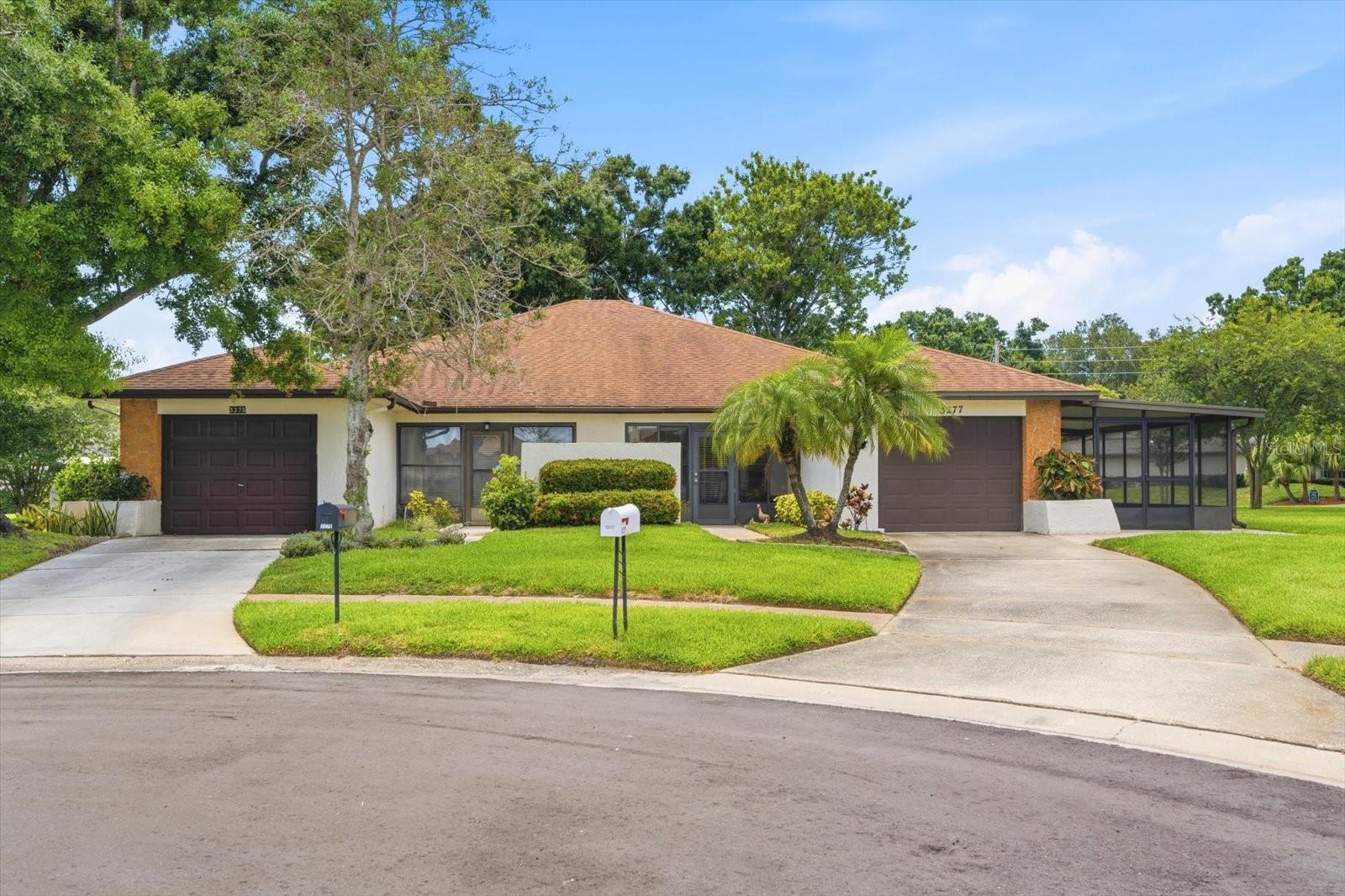 Desirable Highland Lakes 2-bedroom, 2-bath, 1 car garage villa on an oversized corner lot. Welcome to Highland Lakes on Lake Tarpon, a premier active 55+ community in North Pinellas County. Enjoy Gulf Coast Living at its finest, just minutes from the beaches, Dunedin, Clearwater, St. Petersburg and Tampa. This well-maintained villa is priced to sell and ready for your personal touch. The spacious kitchen offers ample counter space, abundant cabinetry, newer stainless-steel appliances, and a convenient pass through to the dining area. The primary suite features generous closet space and a private en-suite bath, while the guest bedroom includes a walk-in closet. A bright sunroom near the front entry provides a peaceful flex space for relaxation or hobbies. The extended screened lanai showcases new epoxy flooring (2025), double front-entry doors, paver accents, and a lush green yard-perfect for parking your golf cart after a round of golf or a community event. Highland Lakes owners enjoy unlimited golf on three private 9-hole courses and putting greens, all included in the low HOA fee. Resort–style amenities feature a clubhouse for social events and entertainment, two heated pools, a whirlpool spa, pickleball and tennis courts, a fitness center, shuffleboard courts, and a marina with boat docks and a fishing pier. RV and boat storage are also available. Cable TV, high speed internet, lawn care and trash service are included, providing exceptional value and a maintenance-free lifestyle.
The water heater was replaced in 2012, while the roof and HVAC were replaced in 2010. Being sold as-is and mostly furnished.