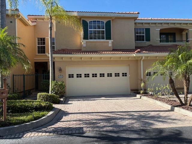 SPACIOUS TOWN HOUSE in a private and beautifully landscaped community, on a quiet dead end street. A courtyard gate great for pets, flowers, and fresh air entry to your stylish home with lanai access to community pool and spa. An oversized screened lanai looks onto garden space with fountain views. 3 full bedrooms, 2.5 baths, guest bath on first floor for entertaining, 10ft ceilings and large rooms. A bright and open master suite has 2 walk-in closets. A large second bedroom with connecting bath and walk-in closet makes for an alternative primary suite, and the guest bedroom has an equally roomy walk-in. Conveniently located in a preferred school zone and near so any amenities (Costco, new Trader Joes and Whole Foods, Planet Fitness, and YMCA), shopping, dining, and only 5 miles to Siesta Key beaches. It’s a perfect blend of retreat and comfort in a superb location!
 BRAND NEW barrel tiled roof 2024 and all buildings recently repainted. Additional improvements include new AC system November 2023, Garage door springs 2019, Kitchen faucet and disposal 2020, Master bath faucets 2025, New microwave and washer and dryer in 2021. New Master bath shower doors 2024, and New chain drives and garage door opener/wireless entry for garage 2025.