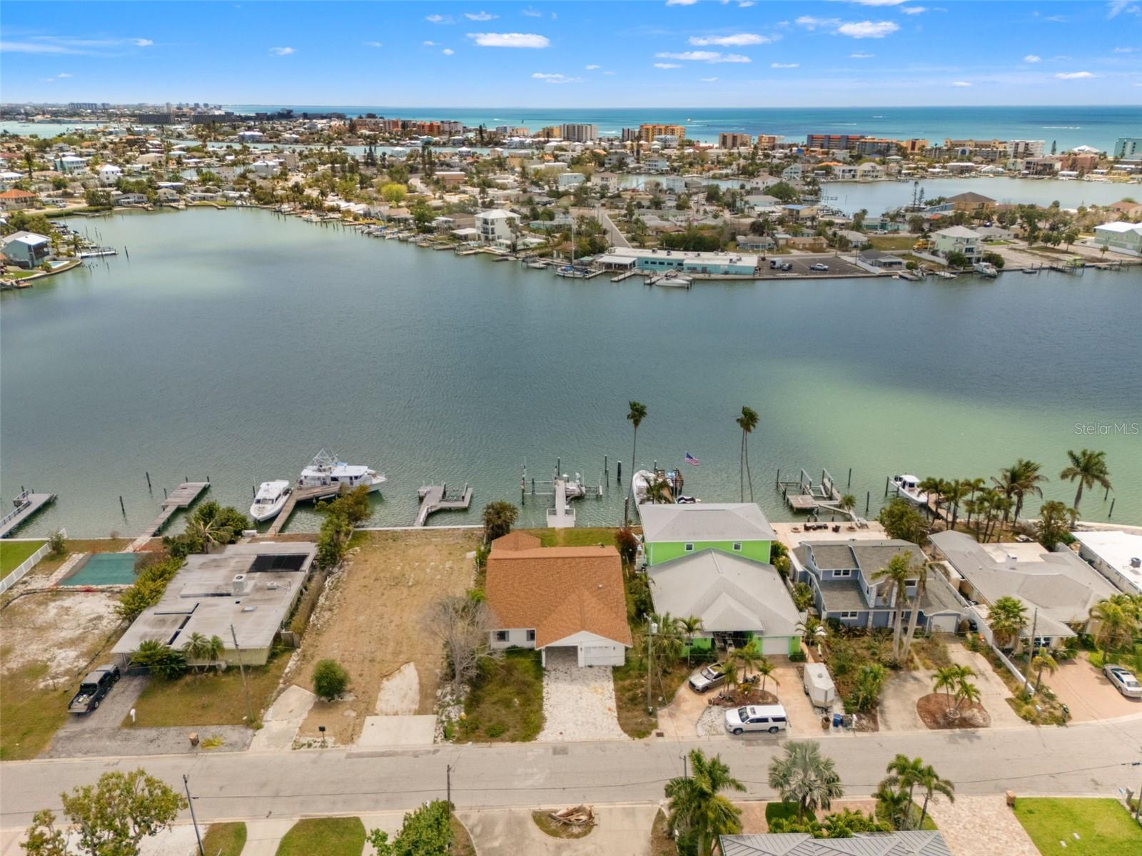 Positioned on a 60 x 120 waterfront lot in Bay Point, this property offers sweeping open views of Boca Ciega Bay and deep water access ideal for boaters and anglers alike. With two boat lifts already in place, it’s a rare opportunity to enjoy immediate waterfront functionality or reimagine the site into a custom new build.Just moments to the Gulf beaches, the location delivers the best of both boating and beachside living in one of Madeira Beach’s most desirable waterfront pockets.
For builders and investors, the lot presents an exceptional redevelopment opportunity, and the seller may be open to partnering with a custom builder in a joint venture scenario. A rare offering in a coveted waterfront setting, contact the listing agent directly for a private showing or to discuss the full scope of opportunity.