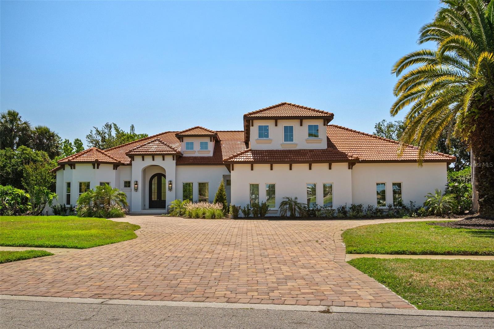 Get ready to be impressed by this exceptional lakefront residence at 14511 Isleview Dr in Winter Garden, fully renovated by the renowned Davila Homes. Set directly on the pristine shores of Lake Hancock, this luxury property offers breathtaking water views and a private dock, perfect for boating, sunset lounging, or embracing the ultimate Florida lifestyle. This thoughtfully designed home features 5 spacious bedrooms, including a private mother-in-law suite ideal for multigenerational living or guests. A dedicated home office provides the perfect space for remote work or quiet study, while a fully equipped home gym adds to the home’s functional appeal. At the heart of the home is a stunning chef’s kitchen, complete with top-of-the-line appliances, custom cabinetry, and premium finishes—designed to impress both everyday cooks and seasoned entertainers alike. With refined modern design, high-end finishes, and meticulous attention to detail throughout, this residence offers an unmatched blend of luxury, comfort, and lakefront living in one of Winter Garden’s most desirable locations.