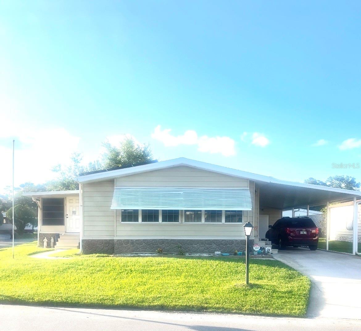 Welcome to 4412 Teka Place— a well-maintained manufactured home with deeded land located in the desirable Teka Village community of St. Cloud. This spacious home offers approximately 1,516 heated square feet with a comfortable layout, generous living areas, and plenty of natural light throughout. Situated on an oversized 0.18-acre lot, the property provides room to relax, entertain, or enjoy outdoor living.
Conveniently located near major highways including FL-417, the Turnpike, and US-192, offering easy access to Orlando, Lake Nona, Medical City, Sanford, shopping, dining, and Central Florida attractions. Low HOA and located in Flood Zone X for added peace of mind. Whether you’re looking for a primary residence, seasonal getaway, or investment opportunity, this property offers comfort, convenience, and value in a growing area of St. Cloud.