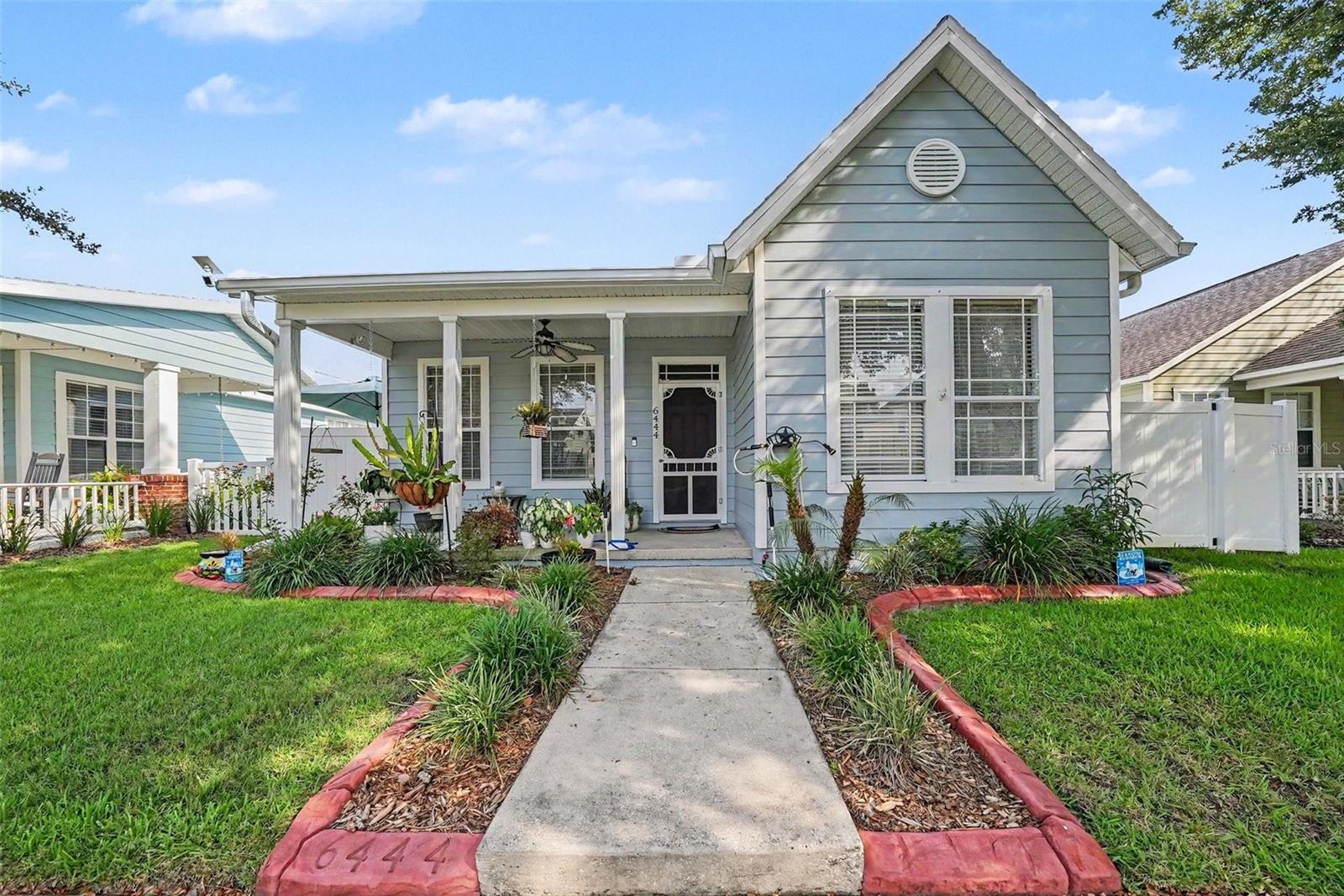 Wow! This one shows like a model home. Very neat, clean and move-in ready! This home features higher than average ceilings, ceramic tile and wood-laminate flooring, matching kitchen appliances, 2 porches, rear-entry 2 car garage, large kitchen with breakfast bar and much more. The neighborhood is conveniently located within the city and walking distance to the YMCA. HOA fees are very reasonable and no CDD fees. Hurry this one won't last long!!