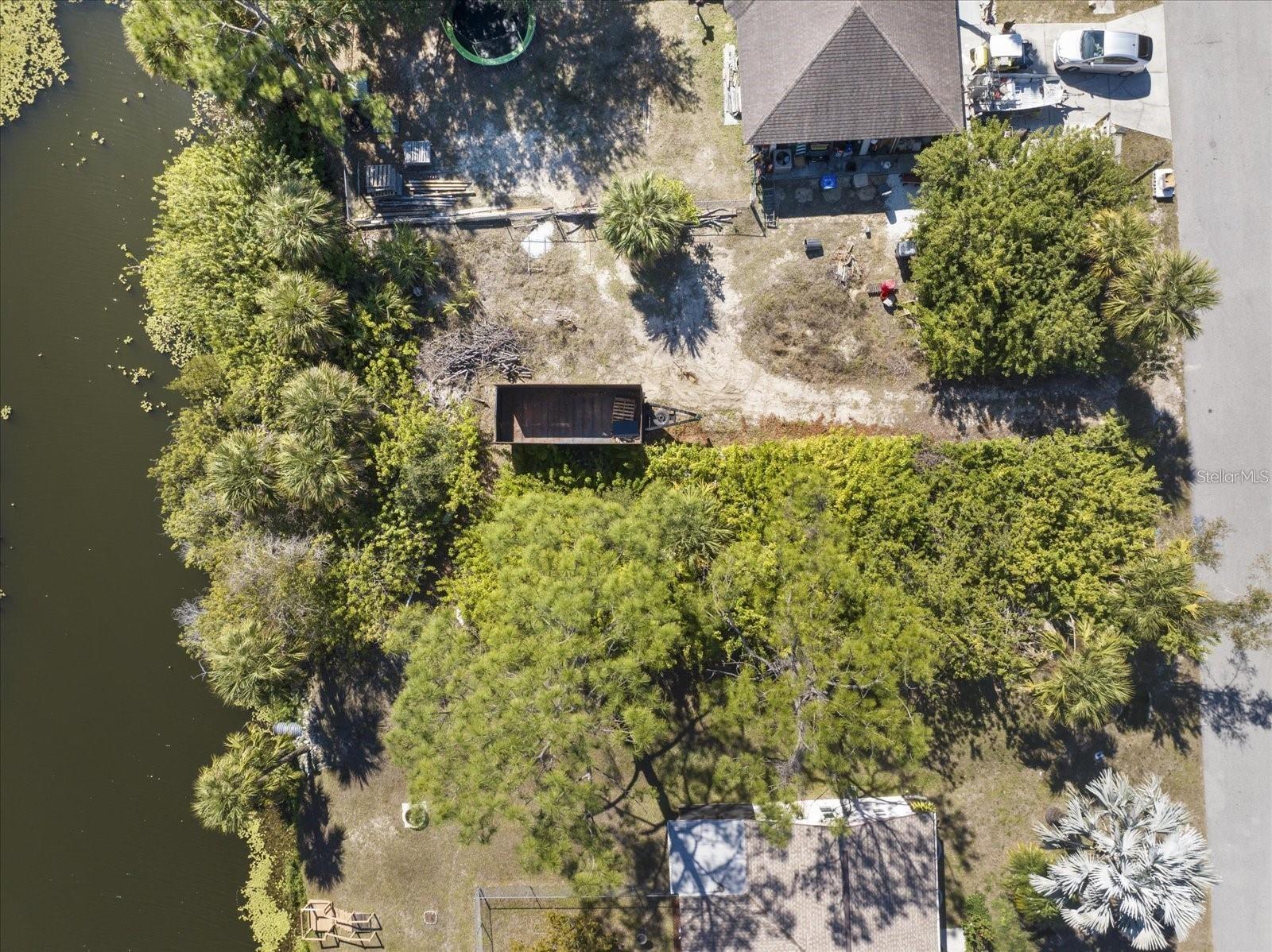 Gorgeous waterfront homesite with city water, situated in a well-established neighborhood with no HOA, no CDD fees, and no deed restrictions. Enjoy a prime location just minutes from I-75 and the shopping and dining options throughout North Port. Plus, you’re a short drive to some of Florida’s top beaches, championship golf courses, retail centers, and family-friendly attractions like the water park. Located on Natrona Dr between 1166 Natrona Dr and 1218 Natrona Dr.