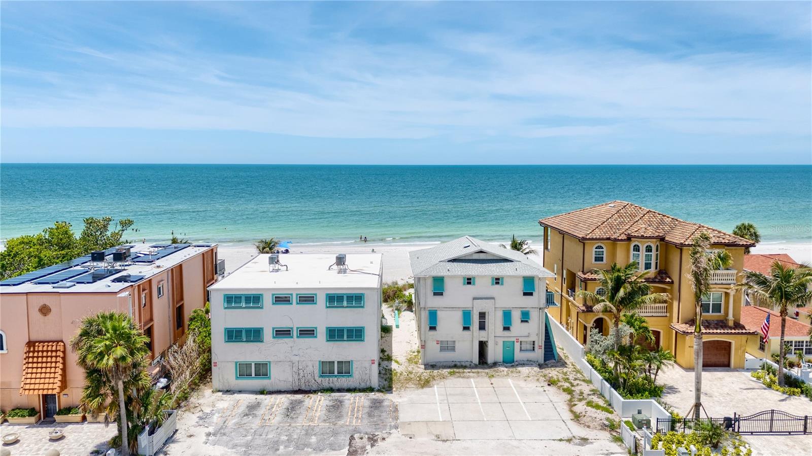 50 feet of Gulf frontage!!! Remodel or rebuild!! The property has water damage. 19310 Gulf Blvd zoned hotel/motel consists of four Gulf front villas nestled in the heart of Indian Shores, Florida – a quaint coastal town located a few miles south of Clearwater Beach and just 30 minutes from Tampa International Airport. Properties have been used as vacation rentals. There are two 1 bedroom villas located on the top floor, offering spectacular views. The 3 bedroom, 2 bath villa encompasses the entire 2nd floor, featuring a master suite and main living area with stunning views of the Gulf. This villa offers a 36x11 covered terrace overlooking the white sands of Indian Shores. There is also a 2 bedroom villa  with  located on the lower level with easy access to the beach.   The entire property was used for seasonal vacation rentals. 19306 also available for $3,500,000