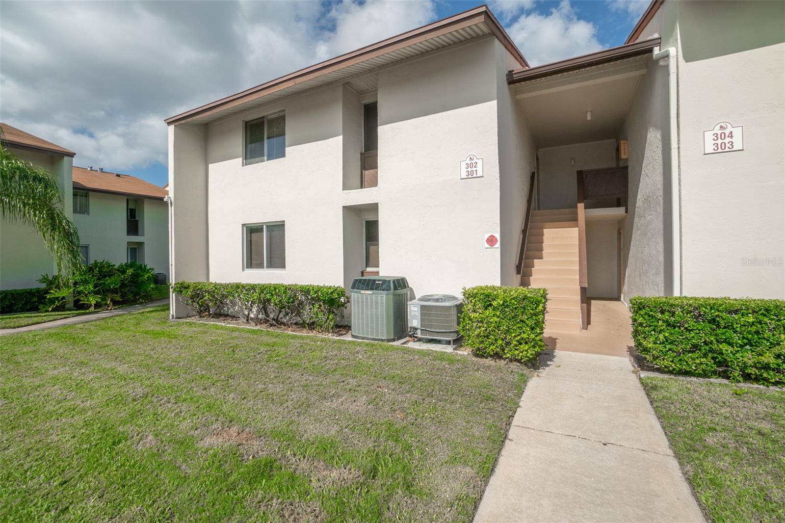 SELLER IS MOTIVATED! 2-bedroom, 2-bath beachside condo in the heart of Cape Canaveral--move-in ready and priced to sell! Key Highlights: New HVAC system (April 2026) | Updated kitchen and bathrooms | Convenient In-unit laundry | LOW HOA at $545/month! | New building roof and paint in 2025--special assessment already paid | All Hidden Harbor buildings are 2-story, exempt from rigorous state structural inspections and remediation requirements | No pending or anticipated future assessments | Walking distance to Cornerstone Plaza -- restaurants, shops, and Publix | One assigned parking space with ample guest parking | Enjoy community amenities, including a pool, clubhouse, and tennis courts. Schedule your showing today!