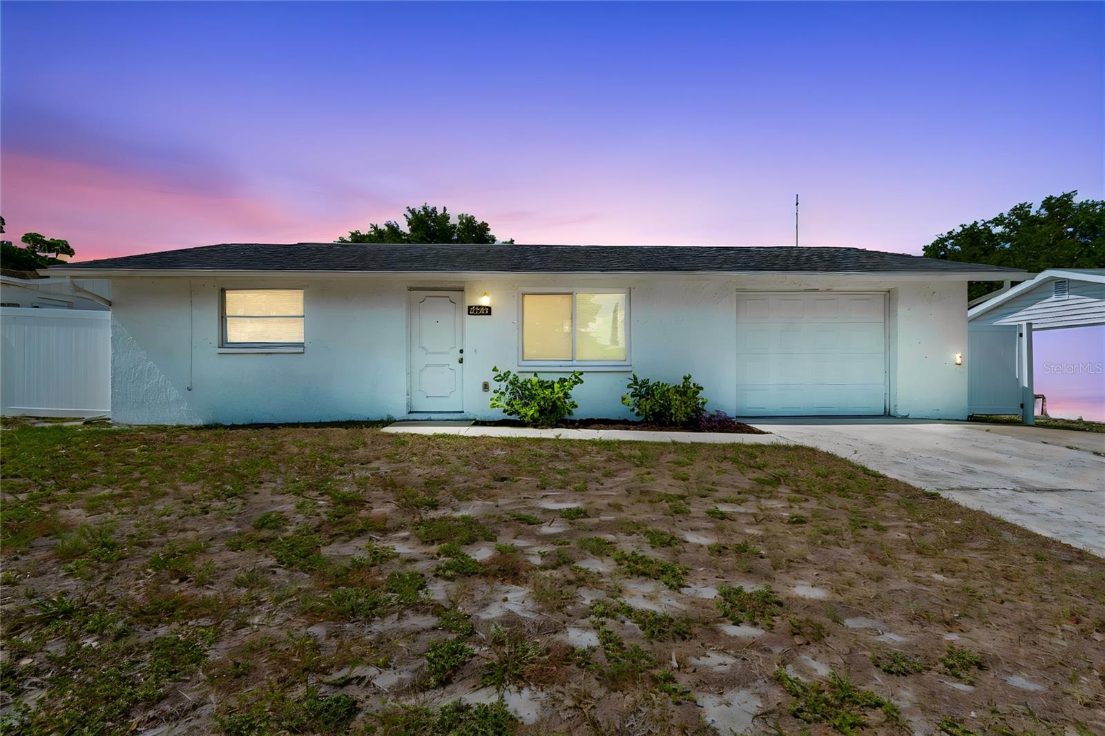 Bring your imagination!! Great starter home or investment opportunity! This is a 2 bedrooms, 2 full baths, and 1 car garage home located in the heart of the city of New Port Richey.  Nestled in the established Hillandale community, this well-maintained residence features a functional floor plan with bright living spaces, spacious bedrooms, and plenty of natural light throughout.  Step outside to a generously sized backyard privately vinyl fenced backyard with room for entertaining, outdoor gatherings, or future improvements.  

Built with durable block construction and situated on a low-maintenance lot, this home is ideal for first-time homebuyers, seasonal residents, or investors seeking a great opportunity. Conveniently located near shopping, restaurants, parks, medical facilities, and the vibrant downtown New Port Richey district, you'll enjoy easy access to everything such as Gulf beaches, boating,  outdoor recreations and  close airports which are just a short drive away.  Roof is 2019.   Book a showing and check it out today!