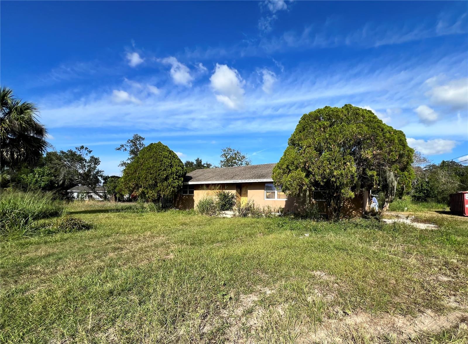 DON'T MISS THIS OPPORTUNITY TO OWN 5 ACRES OF HIGH AND DRY LAND WITH THE FREEDOM OF NO HOA!!!! This AMAZING property includes a once beauifully refurbished 2,157 sqft 4 bedroom 3 bathroom home that now needs extensive repairs.... Whether you choose to save this home and bring it back to life OR build a new custom home you'll be surrounded by your 5 amazing acres!!! While your entrance conveniently sits right on the 60, the majority of your 5 acres is tucked back offering a ton of privacy!!! Bring ALL of your animals, ALL of your toys, there's even room for ALL of your family!!! THE SKY'S THE LIMIT! What will YOU choose to do with this one of a kind property??? MORE PICS TO COME....