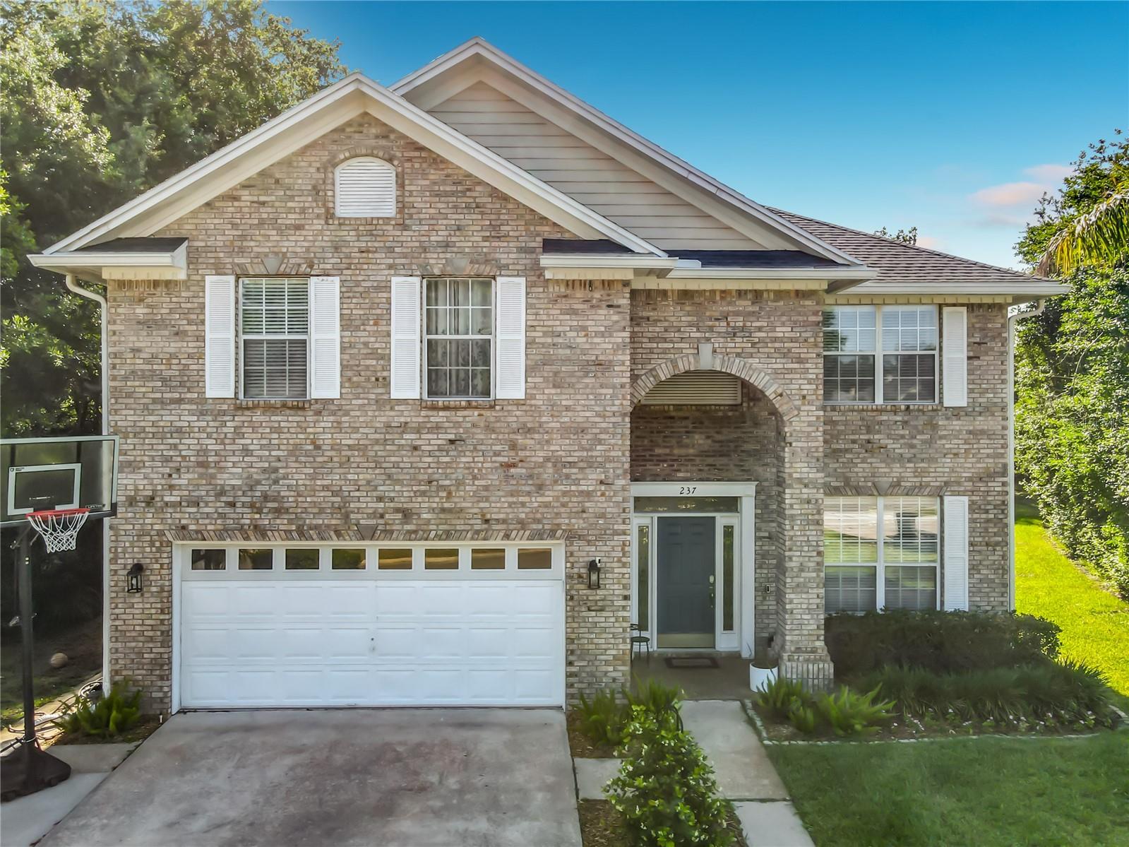 Looking For A 5-Bed Home In Debary Plantation With A Luxury Pool, Golf Course Views, And Major Upgrades Already Done (Brand New Roof 5/2026 and 5/2023 home was completely re-piped/replumbed)? Welcome Home! This Beautifully Maintained Two-Story Brick-Front Home Is In A Premium Location On The 8th Hole In One Of Debary’s Most Desirable Golf Communities. From The Moment You Arrive, This Traditional-Style Home Makes A Lasting Impression With Its Brick Exterior, Grand Entry, Mature Landscaping, And Welcoming Curb Appeal. Inside, The Flexible Floor Plan Is Designed For Both Everyday Living And Entertaining. The First Floor Features A Spacious Living Room With A Cozy Brick Fireplace, Dining Or Flex Room, Half Bath, And An Open-Concept Kitchen That Connects To The Main Living Areas. The Kitchen Offers Granite Countertops, Breakfast Counter Seating, Stainless Appliances, Oversized Pantry Storage, And Views Straight Out To The Incredible Backyard Retreat. The Outdoor Living Space Truly Sets This Home Apart From Others. Step Outside To Your Private Screened Saltwater Pool Oasis Featuring A Stunning Pebble Tech Finish, Decorative Tile Accents, Elegant 24x24 Porcelain Tile Pool Deck, And Covered Lanai Perfect For Relaxing Or Entertaining Year-Round. The Smart-Controlled Variable Speed Pump With Heater/Chiller Combo Allows You To Heat Or Cool The Pool From Anywhere, Giving You True All Year-Round Enjoyment. Upstairs You Will Find The Spacious Primary Suite, Four Additional Bedrooms, Full Hall Bath, And Convenient Laundry Room. The Primary Suite Offers A Comfortable And Relaxing Space With Luxury SPC Flooring, Crown Molding, And Large Windows That Bring In Plenty Of Natural Light. The Spacious Bathroom Includes Dual Vanities, Lots Of Counter Space, Decorative Details, A Large Soaking Tub, And An Oversized Walk-In Shower For A Spa-Like Feel. Additional Upgrades And Extras Include Luxury SPC Flooring On 2nd Floor, Complete Home Repipe In 2023, New Roof Replaced May 2026, Attic Insulation Added For Efficiency, Interior Paint Completed One Year Ago, New Garage Door Opener, Gutter System With Gutter Guards Just One Year Old, Smart Irrigreen Irrigation System Which Helps Reduce Water Waste, Invisible Dog Fence Wiring, And EV Charging Capability In The Garage. All Appliances Stay, Including Washer And Dryer. The Home Also Features Two AC Systems, One Just 1 Year Old And The Other 5 Years Old, Both With Warranties. Located Approximately 10 Minutes To The Debary SunRail Station, Minutes To I-4, About 35 Minutes To Downtown Orlando, And Roughly 40 Minutes To Florida’s East Coast Beaches. From The Luxury Pool To The Golf Course Views And Everything In Between, This Home Offers The Florida Lifestyle Buyers Dream About. Call For A Showing Today!