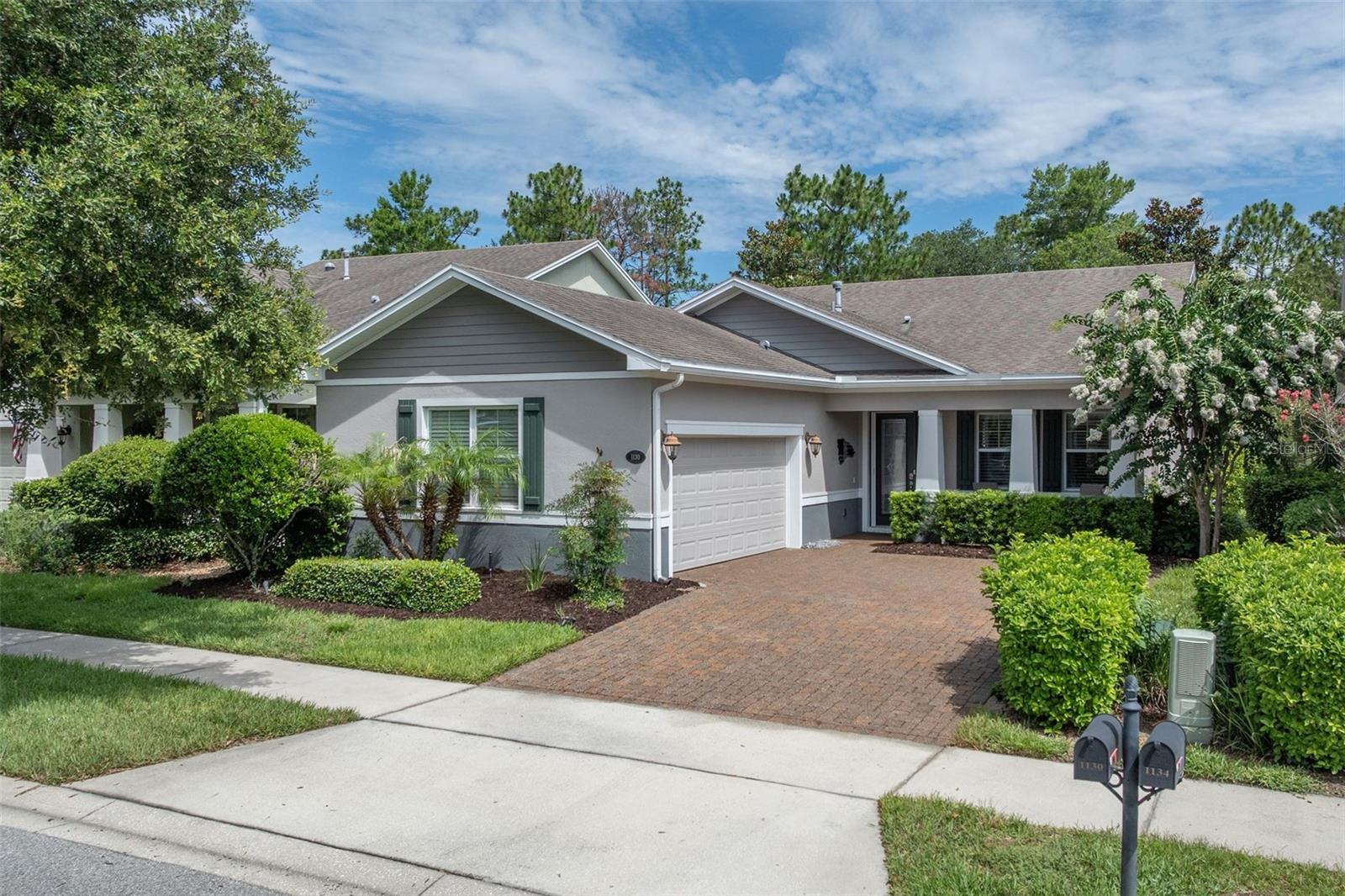Welcome to this stunning, move-in ready home in one of DeLand's most sought-after gated communities—Victoria Gardens at Cresswind, an active 50+ community. Perfectly situated on a private conservation lot with no rear neighbors, this beautifully maintained 3-bedroom, 2.5-bath   home features a 2-car side-entry garage with a pull-down screened enclosure and a custom 'Closets by Design' garage makeover, offering the perfect blend of comfort, elegance, and Florida living. The open floor plan features a spacious great room, formal dining room, and an upgraded chef's kitchen with 42" cabinetry with pull-outs, granite countertops, tile backsplash, a large working island, Butler's pantry, newer stainless-steel appliances, and a NEW convection double-oven range with built-in air fryer. The King sized Owners Suite offers views of the conservation w 2 walk-in closets, an adjacent master bath with double separate vanities, corner glass shower with Soaker tub w private commode. Featuring 'On Demand' Hot Water. There are two more bedrooms, one full bath and powder room.
Recent updates include a NEW high-efficiency Trane 2-stage A/C and furnace, water heater (2022), smart garage door opener with keypad, and new garbage disposal. The climate-controlled garage features a mini-split A/C, SWISSTRAX flooring, custom storage, and over 400 square feet of additional versatile space.
Relax on the expansive 22x14 screened lanai overlooking peaceful conservation views, or take a short stroll—just one block—to the private clubhouse featuring dining, bar, fitness center, resort-style pool, tennis and pickleball courts, bocce, billiards, library, ballroom, crafts, clubs, and endless social activities. The golf course is conveniently located just across the street.
The HOA includes lawn and shrub care with reclaimed water, HD cable, and high-speed internet. Located just minutes from award-winning Historic Downtown DeLand, voted "Best Main Street," you'll enjoy charming boutiques, fine dining, cultural events, and Stetson University. Plus, you're only a short drive from Florida's beautiful east coast beaches, with Publix, Starbucks, Aldi, medical facilities, transportation and I-4 all nearby. Appointment Only.