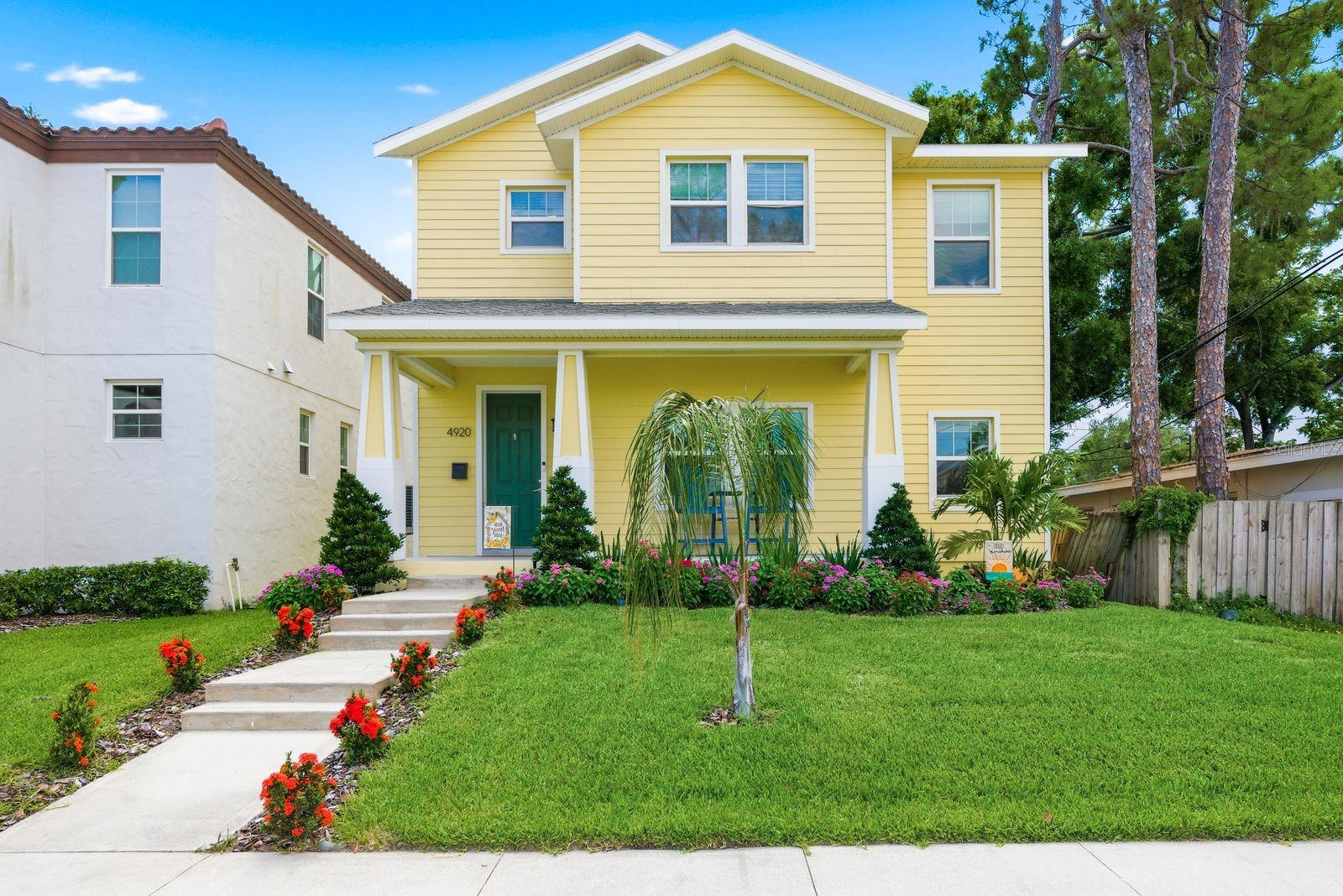 Welcome Home to 4920 3rd St. N! A stunning property that truly delivers on location, comfort, and quality in the heart of St. Petersburg. Built in 2014, this exceptional residence offers peace of mind that comes with newer construction in one of St. Pete's most desirable neighborhoods. This beautifully maintained home offers the convenience buyers are searching for, just a short walk to Whole Foods, Starbucks, shops and restaurants with easy access to downtown St. Pete and only 15 minutes from Tampa International Airport. Step inside to soaring 12-foot ceilings, walls of abundant natural light and a spacious open floor plan. Rich hardwood flooring and luxury vinyl plank run throughout the home, zero carpet anywhere. The chef-inspired kitchen feature solid wood cabinetry, granite countertops, stainless steel appliances and dual GE & Frigidaire ovens, perfect for everyday living and entertaining. The spacious primary suite offers a spa-like ensuite bathroom with walk-in shower, soaking tub, oversized walk-in closet. Upstairs, a conveniently located laundry room sits right next to the primary bedroom. With 3 bedrooms and 2.5 bathrooms across a thoughtfully designed layout, this home lives large. Enjoy the outdoors year-round from the screened back porch, overlooking a fully fenced backyard with brand new white vinyl fence (2025) ideal for dog lovers, family gatherings and outdoor entertaining. The beautifully landscaped yard is supported by a brand new irrigation system and sod (2026). Major updates provide exceptional peace of mind including a new A/C with blue-light purifier (2024), Simonton energy-efficient windows throughout, fresh interior paint, new vinyl fence (2025), roof (2014), hot water (2014) and tented for termites in 2025. Even better, this home has never flooded and features transferable flood insurance for under $900 a year. Move in ready, meticulously maintained and located in one of St. Petersburg's most convenient and sought after areas. This home is the opportunity you've been waiting for. Schedule your private showing today before it's gone!