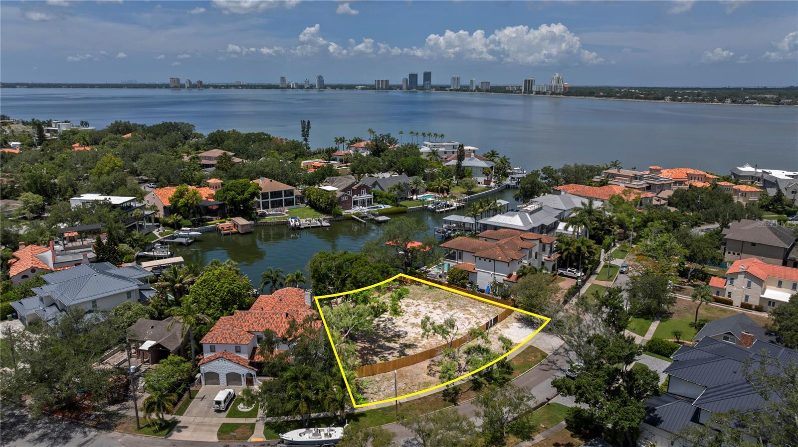 Welcome to a rare opportunity in Tampa's most sought-after neighborhood, Davis Islands! This oversized 16,242 sqft homesite offers breathtaking water views and endless custom potential — a blank canvas ready for the home of your dreams. Sprawling across a generous 105-by-133 lot, this property offers unparalleled tranquility and privacy, with deep water canal vistas and partial open bay views. With 85 feet of water frontage, this property offers unparalleled access to Tampa Bay's pristine waters. Situated on a street that has long been a favorite among professional athletes, this lot offers a rare opportunity to own a piece of South Tampa's rich heritage.