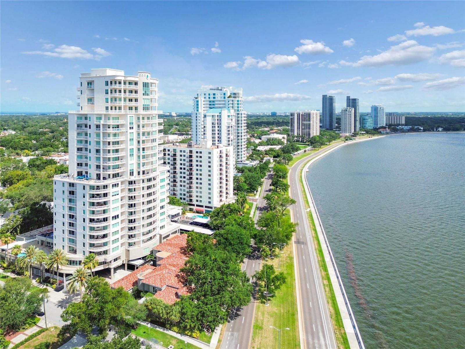 3507 Bayshore Blvd #701 presents an exceptional opportunity to own a luxury waterfront residence along iconic Bayshore Boulevard. Now is the time to schedule your private showing. Why wait years for new construction when this beautifully appointed condominium with newly refreshed kitchen and appliances is move-in ready today? On the seventh floor, this residence captures sweeping, unobstructed views of Tampa Bay and spectacular sunrise vistas from the comfort of your private balcony. The thoughtfully designed open floor plan blends the living, dining and kitchen areas into one seamless space ideal for entertaining or everyday living. The spacious kitchen combines style and functionality with generous prep space, room for multiple cooks and stunning water views that elevate the entire experience. The primary suite offers a peaceful retreat overlooking the bay and features a spa-inspired en-suite bath complete with a soaking tub, walk-in shower, private water closet and dual walk-in closets. Two additional guest bedrooms each include their own en-suite baths, providing comfort and privacy for family or visitors. Residents enjoy an impressive collection of resort-style amenities, including a sparkling swimming pool, fitness center, theater room with updated lounge seating, secure building access and 24-hour concierge service. Additional highlights include two assigned parking spaces (#30 and #219), guest parking, and a private 5-by-7-foot storage unit outside the residence. Ideally near downtown Tampa, this premier address places you moments from award-winning dining, upscale shopping, entertainment and cultural attractions while offering the tranquility of waterfront living. Rarely does an opportunity like this become available on Bayshore Boulevard!