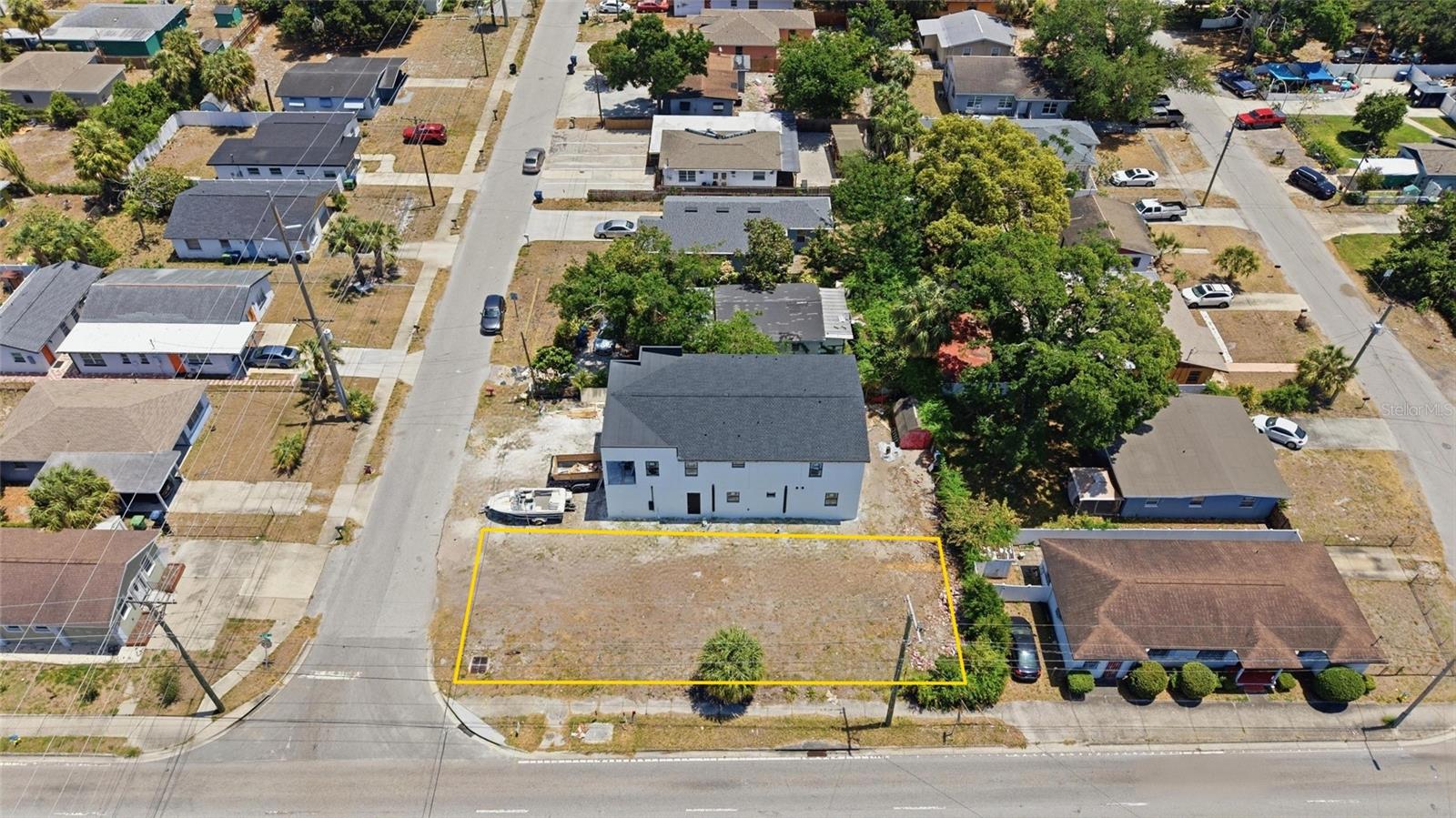 Exceptional opportunity to secure a cleared, corner, build-ready lot in the heart of West Tampa (33607), one of the city’s fastest-growing and most dynamic areas. Zoned RS-50, this property is ideal for a custom single-family residence, offering flexibility to design and build in a location seeing significant redevelopment and rising home values. Positioned on a desirable corner, the lot provides added design potential, enhanced curb appeal, and increased presence. The immediate area continues to trend upward, with new construction nearby—including a neighboring million-dollar home—supporting long-term value and investment confidence. Just minutes from Downtown Tampa, Midtown, Raymond James Stadium, Tampa International Airport, and with easy access to I-275, this location offers exceptional convenience to major employment hubs, dining, retail, and entertainment. Drive by, take a look, and start planning your vision today.Public utilities available. No HOA restrictions. With land opportunities in central Tampa becoming increasingly limited, this is your chance to build new, create equity, and capitalize on the continued growth of this high-demand corridor.Drive by, take a look, and start planning your vision today.