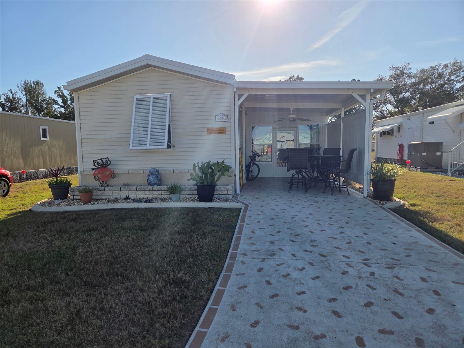 Beautifully maintained and updated manufactured home featuring a new metal roof and lanai. The home offers newer appliances and skylights throughout, filling the space with abundant natural light.
Enjoy outdoor living on the large rear deck, the perfect spot for morning coffee or evening cocktails while taking in stunning sunset views.
Located in a desirable 55+ community with a wonderful heated community pool. The property is being offered fully furnished—just bring your toothbrush and personal items and you’re home!
All information deemed reliable from county records. Buyer to perform due diligence.
Musical instruments and personal items do not convey.