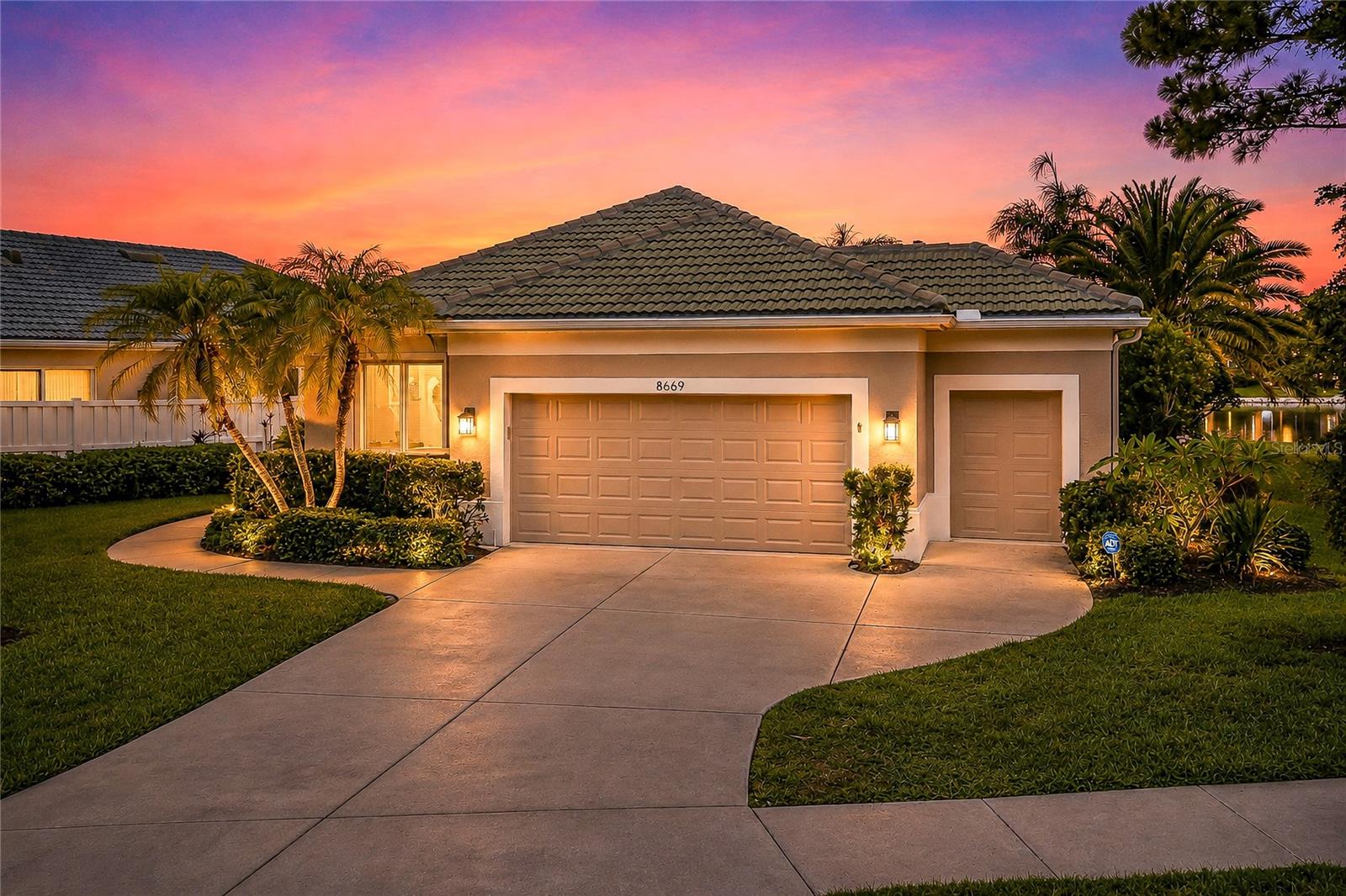 Reduced List Price! Welcome to paradise within the highly sought-after Rosedale Golf & Country Club community! This meticulously maintained maintenance-free home offers 1,837 square feet of light and bright living space featuring 2 bedrooms, 2 full baths, plus a versatile study/den. The open great room and dining area create the perfect setting for everyday living and entertaining. BRAND NEW TRANE HVAC installed June 10th, with 10 Year Warranty! HURRICANE READINESS WITH JUST A PUSH OF A BUTTON! Remote to lower the hurricane screens.

Situated on one of the most spectacular waterfront lots in Rosedale, this oversized private homesite showcases breathtaking wrap-around water views surrounded by lush tropical landscaping. Enjoy peaceful mornings and stunning sunsets from your private outdoor retreat complete with an in-ground heated spa, side patio, and serene natural surroundings. Nature lovers will appreciate the abundance of Florida birds and the nearby eagle’s nest offering a rare opportunity for daily wildlife viewing right from your backyard.

The spacious kitchen is designed for both functionality and comfort featuring a breakfast bar, built-in desk area, walk-in pantry, and an inviting eat-in dining space positioned beside open sliding glass doors overlooking the private side courtyard and tropical landscape.

The spacious 2 1/2-car garage includes dedicated golf cart parking, ideal for enjoying the country club lifestyle. Numerous upgrades and improvements include a New 2023 roof, Whole Home Hurricane Shutters & Storm Smart Hurricane Roll-Down Screens!, 2026 lanai freshly painted, LED lighting throughout, 2024 spa heater, custom valances, designer lighting and fans, plus a gas hookup ready for your future outdoor kitchen.

Experience the perfect blend of privacy, views, luxury, and maintenance-free living in one of Lakewood Ranch’s premier gated golf communities. Rosedale Golf & Country Club is a premier gated community offering golf, tennis, fitness, dining, and vibrant social activities—everything you need to embrace the Florida lifestyle to the fullest. Don’t miss your chance to call this exceptional property home. Schedule your private showing today! This one will not last...No Mandatory Memberships & No CDD Fees Here!