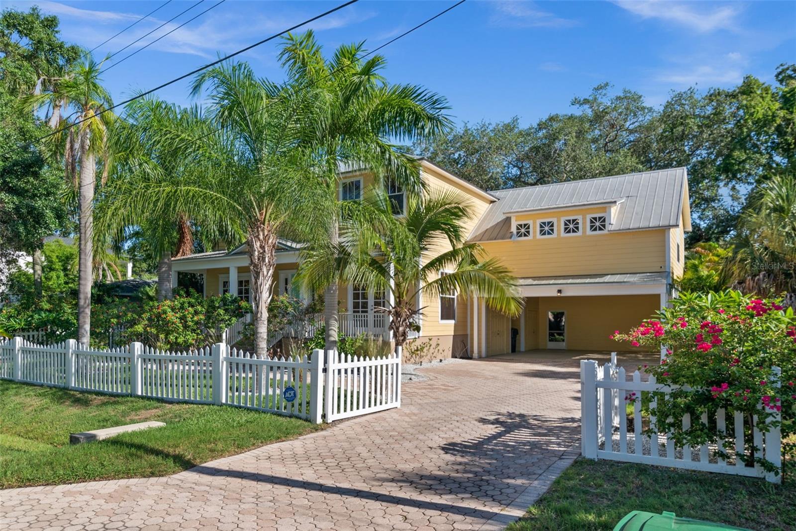 Motivated sellers. Offering up to $15K for buyer's home projects or towards a point buy down! Welcome to a tropical paradise! This stunning custom-built Key West style home offers ample parking, tropical landscaping, and captivating curb appeal. Over the years, the owners have made several improvements while entertaining friends and family, resulting in a truly inviting and charming property.
Among the delightful additions is a sparkling saltwater pool with an oversized heater, complemented by a two-story screened pool cage that extends to include the master bedroom's balcony, providing a captivating view from above. Additionally, a covered outdoor kitchen awaits with a grill, propane burner, sink, ceiling fans, TV, and a convenient half bath. This outdoor space is perfect for hosting gatherings and enjoying the wonderful weather.
Inside the home, you'll discover an expansive open kitchen equipped with stainless steel appliances and adorned with beautiful granite counters and wooden floors. A formal dining room, formal living room, and family room offer various spaces for relaxation and entertainment. Adding to the charm are exquisite French doors on both the front and back patios, as well as the master bedroom balcony, allowing easy access to outdoor areas.
Venturing to the second level, you'll find the primary suite, boasting two walk-in closets, a deep soaking bathtub, and a walk-in shower with dual shower heads for luxurious comfort. Across the hall, there are two additional bedrooms, accompanied by another full bath. The laundry room on this level features a deep sink and attractive storage cabinets for added convenience. At the end of the hall, a cozy carpeted room offers versatility and can serve as an oversized bedroom, office, game room, or anything you desire.
The street enjoys low traffic, providing a peaceful atmosphere. Local restaurants, parks, MacDill Airforce Base, and shopping are conveniently close by, ensuring you have everything you need within reach.
Don't miss the opportunity to experience the charm of Ballast Point firsthand. Schedule your private tour today and discover why this neighborhood will hold a special place in your heart forever!