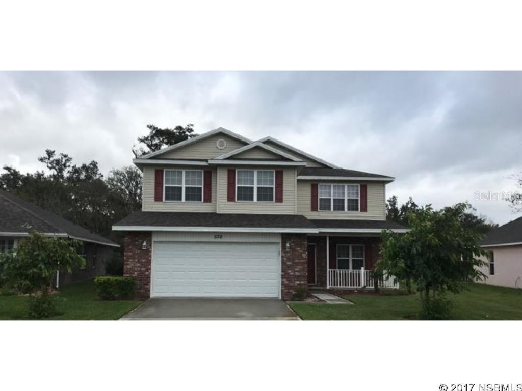 ENJOY THE WATER VIEW! GATED COMMUNITY W/POOL. SPACIOUS AND OPEN TWO STORY 5 BEDROOM HOME WITH MASTER BEDROOM SUITE, EAT-IN KITCHEN,  DINING ROOM AND FAMILY ROOM PLUS 1/2 BATH DOWNSTAIRS.  UPSTAIRS SHOWCASES 4  BEDROOMS, BONUS ROOM/DEN, TWO FULL BATHS INCLUDE JACK & JILL BATH.  STAINLESS STEEL KITCHEN APPLIANCES. A LARGE LAUNDRY ROOM and 11 1/2' x 5' STORAGE ROOM UPSTAIRS. BEAUTIFUL CUSTOM SHADES ALL WINDOWS.  LARGE CONCRETE SLAB IN REAR OF HOME. TUBES IN WALL FOR PEST CONTROL AND SECURITY SYSTEM INSTALLED. A QUALITY HOME BUILT BY ADAMS HOME BUILDERS.  MONTHLY HOA FEE OF $135 MAINTAINS LAWN (INCLUDING MOWING, PRUNING, EDGING, FERTILIZING & IRRIGATION) ENTRANCE GATE, COMMUNITY POOL AND CLUBHOUSE W/EXERCISE ROOM. CORAL TRACE SUBDIVISION IS CONVENIENTLY LOCATED OFF I-95 GIVING EASY ACCESS TO BEACHES, SHOPPING, HOSPITALS, UNIVERSITIES AND ENTERTAINMENT VENUES. LIVE AND LOVE THE FLORIDA LIFESTYLE! ;3rd Party Gr Com Reqd ;Water: City