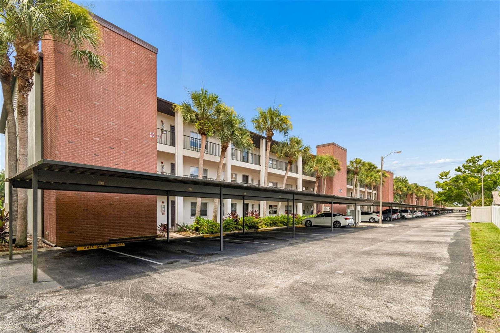 This condo is in the wonderful, desirable Countryside location of Clearwater! It is convenient to everything that makes living in this area a dream!  Minutes to world famous Clearwater Beach, the Dunedin Causeway and Honeymoon Island & Caladesi Island state parks & beaches.  And for the boaters you have a multitude of marinas and put-ins close by!  You have endless entertainment via nearby venues including Ruth Eckard Hall, The Capital Theater and the new waterfront locale for music, The Sound!  For charming boutique shopping and dining you are close to Delightful Downtown Dunedin and the Sponge Docks of Tarpon Springs!  And for big name stores and dining and the movies, you are within walking (if you chose) distance to the Countryside Mall which is surrounded on both sides by even MORE shopping & dining!  For the golfer you have numerous golf courses all around including Dunedin GC, The Landings, Chi Chi Rodriguez GC and the renowned Innisbrook GC!  And on top of all this, your next door neighbor is the City of Clearwater's Woodgate Park with awesome amenities including basketball, pickleball and tennis courts, picnic tables & pavilions, paved walking trails and a playground!  And when you are ready for some down time... come home to this light & bright condo in this sought after area!  This 2 bedroom, 1 bath condo has an open layout that also feels comfy and cozy.  The kitchen has a large pantry closet and an opening to the dining/living room area.  For privacy, the 2 bedrooms are located on each end of the condo.  The larger bedroom and living room opens via sliders to the (bonus!) screened in Florida Room with a view off to the left of the 10th tee of the OTOW golf course.  The 8x24 Florida Room has a large storage closet on one end.  This extra versatile living space is not included in the square footage of the condo.  Add an AC out there and you have an additional 192sf of year round living space!  You can also relax at your peaceful community pool!  And then perhaps shoot some pool and maybe play some darts in the community clubhouse!  There are just so many good things about this property!  Come see this lovely condo in this lovely area and start living the dream!