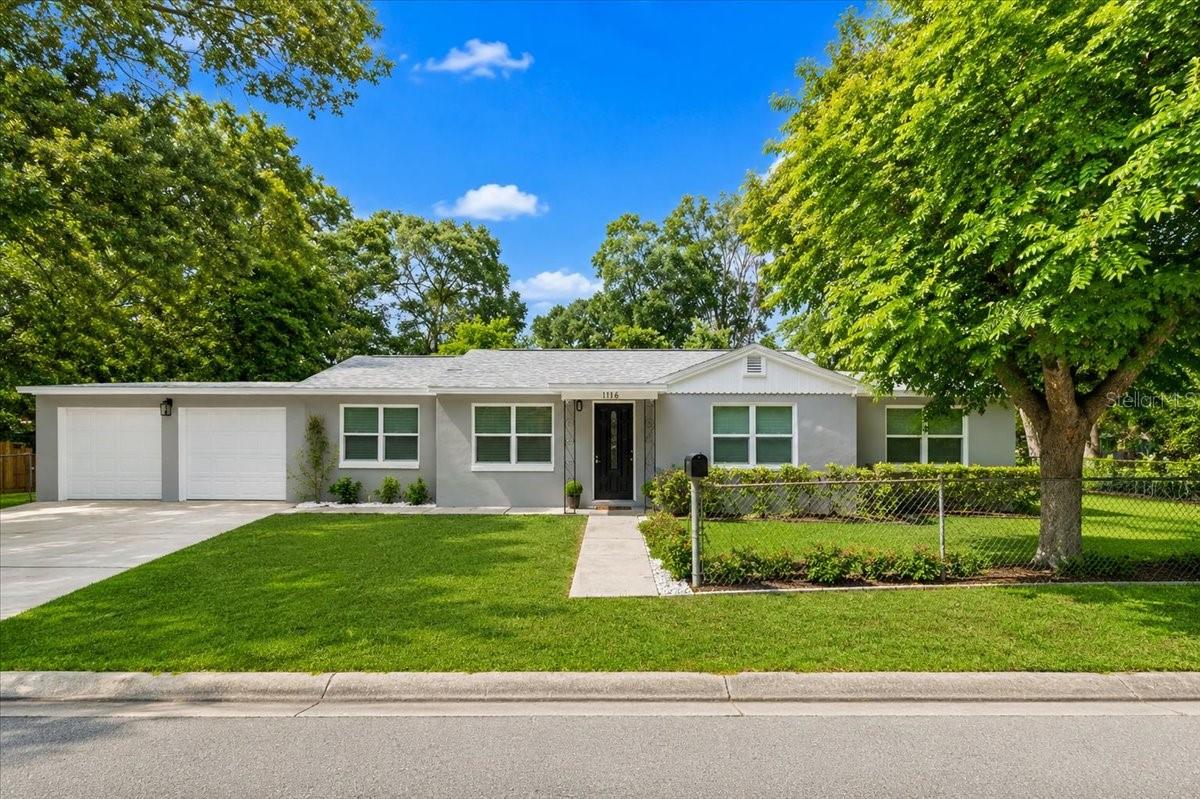 One or more photos has been virtually staged. Move right in to this light and bright 4/2 on a corner lot with a spacious two-car garage! This fully-updated home includes 2026 permits for a NEW roof, plumbing supply lines and an HVAC system. All of the electrical has been updated as well! Located in the center of town, this south facing home has lots of natural light streaming through the energy-efficient, double paned windows. The primary bedroom features a walk-in closet and an ensuite updated bathroom with a tub/shower combo on the west side of the home. There are three additional bedrooms to the east that share the hall bathroom featuring a combination of vintage tile, updated floor tile and a pedestal sink. The kitchen has a new refrigerator, a gas stove and a microwave. Fresh paint and blinds in every room. The fully-fenced corner lot includes raised garden beds and space for an RV with electrical installed and ready to go. The dedicated laundry area just off the garage includes a NEW washer and dryer. The spacious garage also includes a separate room that would be a great workshop or additional storage space. With over 2000 square feet of space under roof, this home is a rare find!