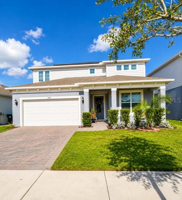 This beautiful home built 2023 features 5 bedrooms which includes 2 ensuites, 4.5 bathrooms, and 3,464 square feet of living space with NO carpets. Home features ceramic tile 1st floor and all wet areas, luxury vinyl 2nd floor, making it ideal for a large family, a growing family, or multigenerational families. Enjoy a 3-car garage with epoxy flooring, a screened-in patio, and an impressive pocket sliding glass door that seamlessly blends indoor and outdoor living perfect for entertaining or relaxing.

One of the home’s most valuable features is the fully paid-off solar system at closing. Providing the future homeowner with protection from rising energy costs and average savings of approximately $300 monthly. Energy bill is currently an average of $38 monthly. Instead of paying high electric bills, those savings can be applied toward the mortgage principal, helping build equity and potentially pay off the home sooner.

If you’re looking for a spacious, energy-efficient home in a thriving fast growing area of East Orlando, 1457 Grand Palm Drive is a must-see.