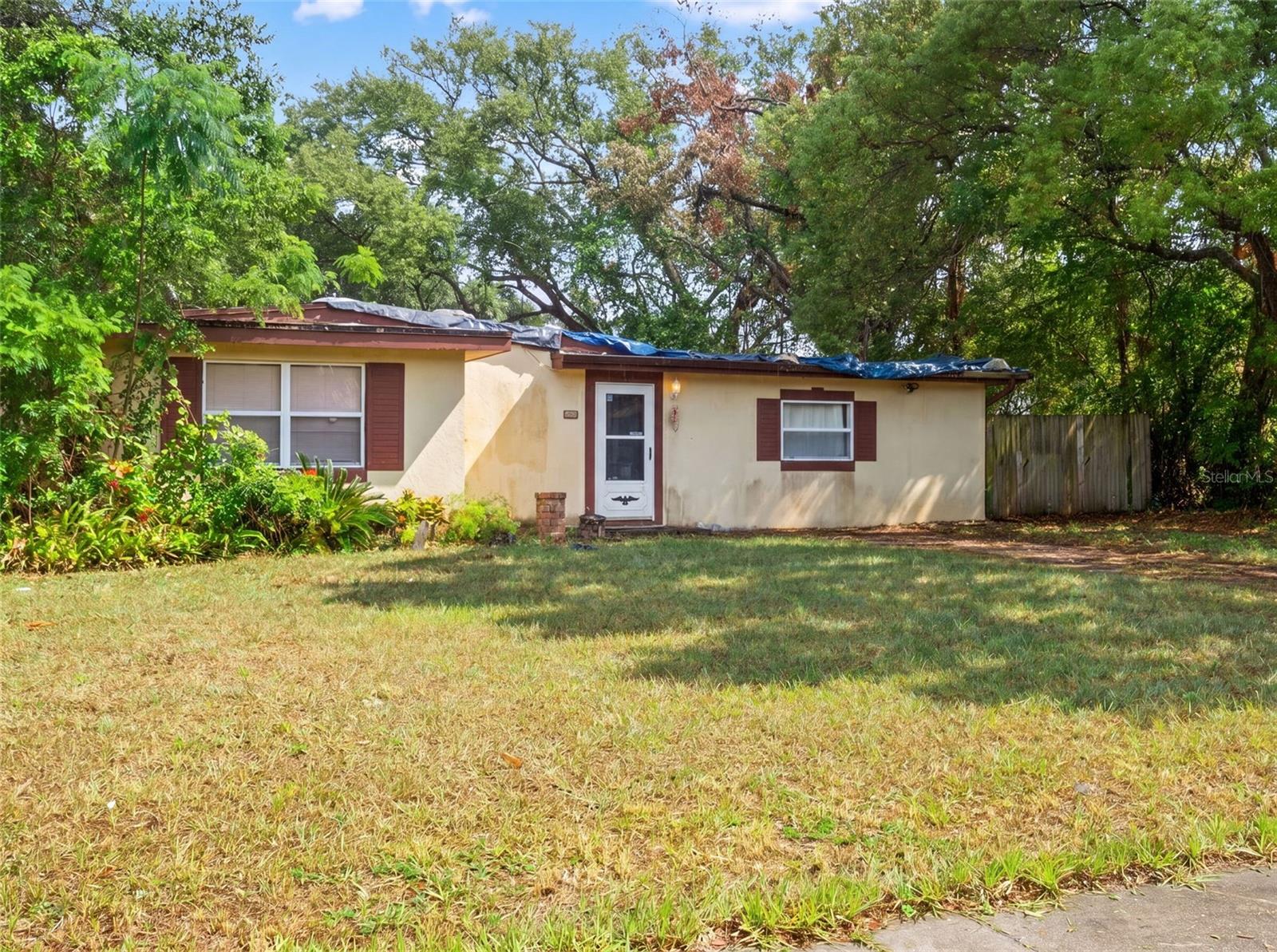 Virtually Staged. Opportunity knocks in East Orlando! This solid block-construction 3-bedroom, 2-bath home sits on a generous 1/4 acre corner lot on Churchill Street — just off Dean Road near SR 50.  This fixer-upper needs some TLC but offers a blank canvas ready for your vision. The spacious kitchen features a gas range, walk-in pantry and breakfast nook. The Great Room is open to the kitchen and overlooks into the backyard. Down the hall, the Primary Bedroom features a sitting room and ensuite bathroom with walk-in shower. The two additional bedrooms share a hall bathroom. The large fenced lot gives you flexibility for outdoor living, ample space for RV parking, trucks, boat or to add a pool.  With no HOA restrictions, this property offers the remodel the property as your own. You'll love the proximity to Jay Blanchard Park and direct access to the Little Econ Trail — perfect for biking, sports or weekend nature walks just minutes from your front door. Whether you're a first-time buyer looking to build equity, an investor seeking strong rental potential or a homeowner ready to personalize every detail — this is your chance to get into a great location at the right price.  Cash Only - home needs a new roof. Close to UCF, Valencia Community College and Full Sail. An easy commute to SR 417 & SR 408. Don't miss this one!