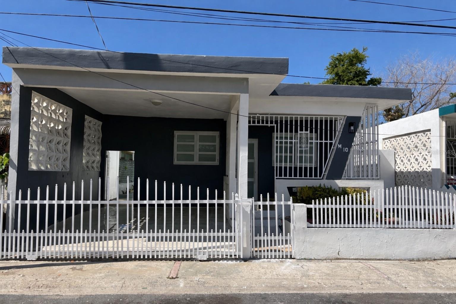 Only 7 minutes from the Airport:

Two-unit property, ideal for living in one and generating income from the other. The main unit features 3 bedrooms, 1 bathroom, living room, dining room, kitchen, and family room. Its high ceilings, abundant natural light, and excellent ventilation make the home feel fresh and comfortable.

Addionally, there is an independent 1-bedroom apartment with 1 bathroom, kitchen, and family area, ideal for rental income, guests, or extended family.

The property includes improvements such as a remodeled bathroom, new doors and windows, new light fixtures, a spacious balcony, and a carport. The house is move-in ready.

Schedule your appointment to see it. A pre-qualification letter or proof of funds is required.