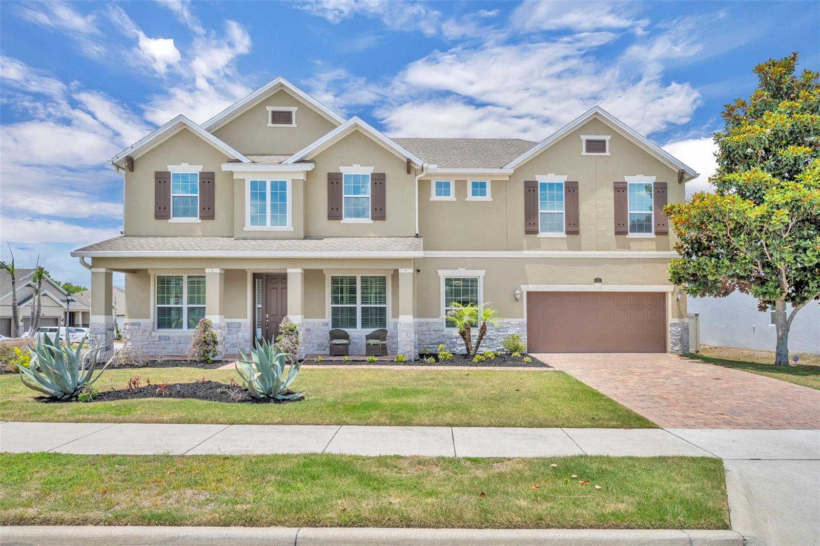 One or more photo(s) has been virtually staged. Price improved and ready for its next owner, this beautifully maintained pool home in the sought-after Verde Park community offers more than 4,240 square feet of thoughtfully designed living space on a beautiful 0.26-acre corner lot in one of Winter Garden’s most beloved communities. With 5 bedrooms and 4 bathrooms, the home delivers an exceptional combination of space, comfort, and Florida outdoor living with a flexible layout designed for everyday living and entertaining.
Inside, elegant formal living and dining rooms, architectural archways, and generous gathering spaces create a warm and welcoming first impression. The expansive family room connects seamlessly to a gourmet kitchen complete with granite countertops, stainless steel appliances, a cooktop, built-in wall oven, and a sunny breakfast nook overlooking the outdoor living area - the kind of space where mornings feel easy and gatherings happen naturally.
The versatile floor plan offers room for a variety of needs, including a downstairs Murphy bed office that is perfect for guests or working from home, plus an additional downstairs bonus room with exciting potential as a next-generation living space ideal for multigenerational families or extended stays. Upstairs, the primary suite wraps you in comfort with a large bedroom, spa-like bath, garden tub, dual vanity, separate walk-in shower, and a custom oversized walk-in closet with built-in storage. The second floor also features a large open loft with a convenient kitchenette and a dedicated media room, creating the perfect setup for movie nights or entertainment.
 Outdoors, enjoy a private screened pool and lanai, covered patio, and summer kitchen designed for year-round enjoyment. The home is also EV charging ready, adding modern convenience for today’s lifestyle.
When you’re ready to explore, everything is right at your doorstep. Enjoy walkable access to the West Orange Trail, perfect for morning bike rides, jogging, or evening strolls. Major shopping, including Costco, popular retail, and everyday conveniences, is just minutes away, charming downtown Winter Garden, with its vibrant farmers market, local dining, and boutique shops, is a short drive from home. Add easy access to Montverde Academy and the Florida Turnpike, and this location truly checks every box. Some photos are virtually staged. Aerial property lines are approximate and should be verified by buyer.
 *Aerial photo property lines are an estimate and to be verified by buyer, some photos are virtually staged