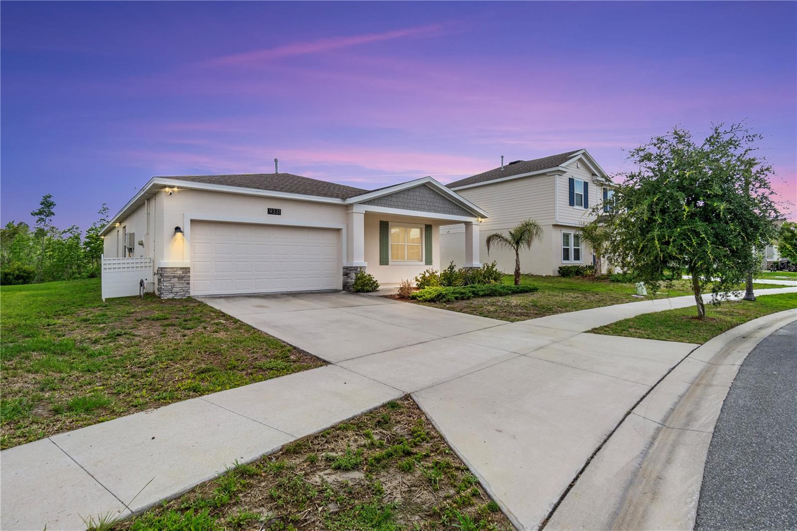 Recently built home in Liberty Preserve featuring 2,100+ sq ft of living space. The main area offers 3 bedrooms, 2 full baths, and a private 1-bed/1-bath in-law suite with kitchenette, sitting area, washer/dryer combo, and G.E. appliances. Highlights include a 2-car garage, Rinnai tankless water heater, new whole-house water softener, upgraded light-gray ceramic wood-plank tile with carpeted bedrooms, 8' entry door, and 9'4" ceilings throughout. All living areas have matching ceiling-fan light combos; the modern kitchen features light cabinetry and pendant lighting over the breakfast bar. Enjoy a private backyard with no rear neighbors plus Ring flood lights and cameras, and easy access to community parks, walking/jogging paths, lakes, historic parks, and antique shops. Ready for comfortable multigenerational living—schedule your showing today.