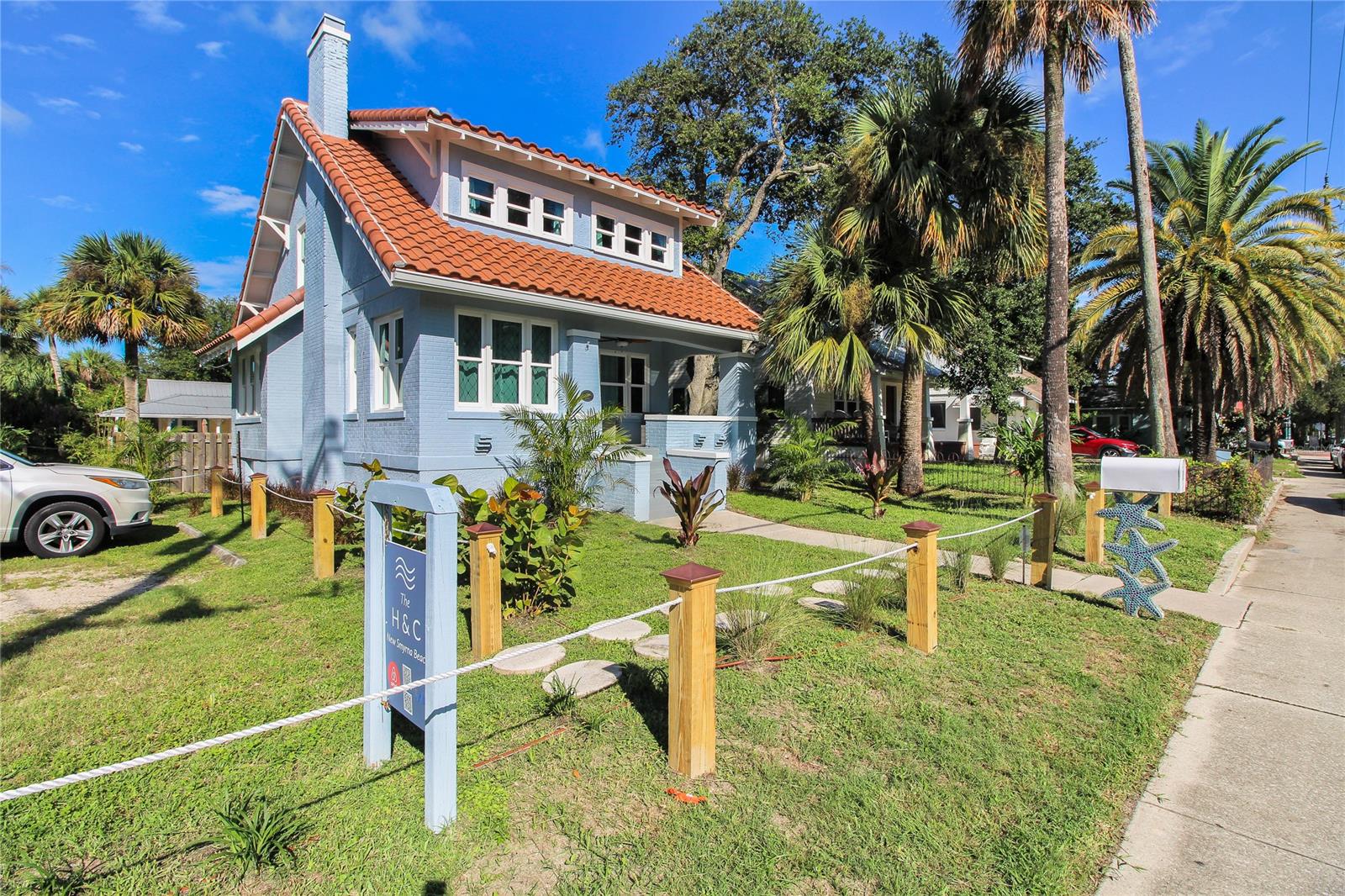Great investment opportunity! Beautiful beachside, turn key fully furnished home and guest cottage with rental bookings that will transfer with sale. 3 bedroom 2.5 bath front home with basement and a 1 bedroom 1 bath 702 sf cottage/in-law suite. Main house sleeps up tp 10 guests and the cottage sleeps up to 4 comfortably. Corner lot, 60 ft frontage, 150ft in the back with an inground pool and courtyard. Windows, roof, patio and basement doors all replaced 2022. Mixed used zoning allows many uses; retail sales services, professional offices, restaurants, bed & breakfast. Short walk to Flagler Ave shops, dining and entertainment area. Just a ten minute walk and you're at the beach. ;Water: City