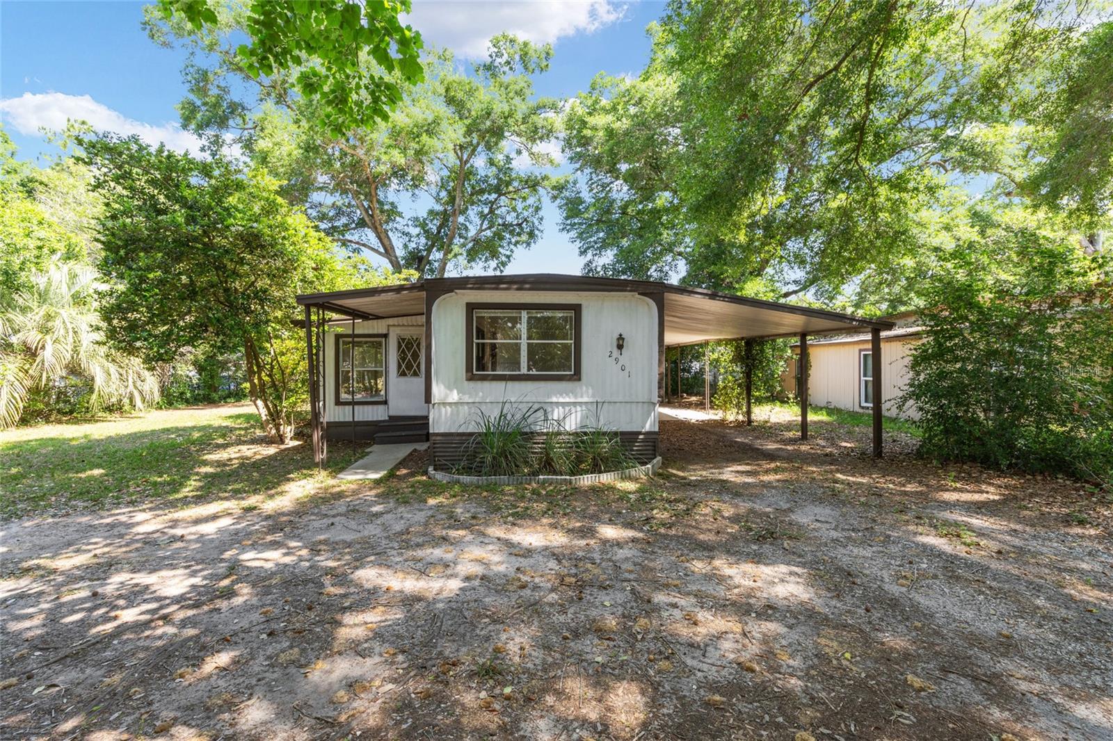 Charming and affordable opportunity in Ocala! This 2-bedroom, 2-bath mobile home sits on its own land--no lot rent, giving you true ownership and long-term value. 

Major updates completed in 2021 provide peace of mind, including a new water heater, refrigerator, stove, central A/C system,  water well, all new plumbing and electrical panel. While the home may need minimal TLC, the big-ticket items have already been taken care of making this a smart and practical investment.

The functional layout offers comfortable living spaces suitable for full-time residents, seasonal use, or rental potential. Enjoy a quiet setting conveniently located near shopping, dining, and major roadways, this property offers both accessibility and privacy. With a voluntary, low cost HOA and no lot fees, this is a fantastic opportunity for homeowners and investors alike. Call today to schedule your tour!