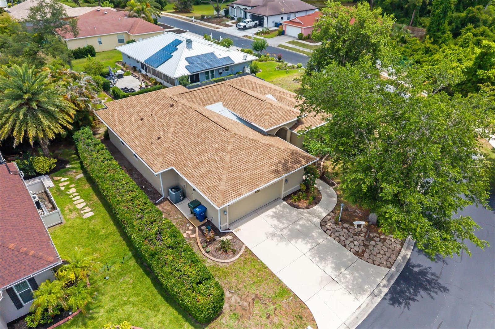 Set within Whispering Crane, a gated 36-home community just south of the University Parkway corridor, this 2,511-square-foot Sarasota residence offers a functional single-level floor plan with three bedrooms, three baths and a large office. The location provides convenient access to University Town Center, downtown Sarasota, Sarasota-Bradenton International Airport, cultural venues, dining, shopping, outdoor recreation and area beaches.

Interior spaces are designed for everyday comfort and entertaining, with high ceilings, natural light, tile flooring in the main living areas and defined spaces for gathering, dining and work. The kitchen features wood cabinetry, granite countertops, stainless steel appliances, a breakfast nook and connection to the main living area. The primary suite includes dual walk-in closets, engineered wood flooring and a bath with dual vanities, a soaking tub and a walk-in shower. Two additional bedrooms and two baths provide flexibility for residents, visitors or extended stays.

Additional features include an oversized laundry room with utility sink and storage, an oversized garage with space for vehicles, tools or recreational equipment and a screened lanai for outdoor dining or relaxation. The home’s no-pool design supports lower-maintenance outdoor living while preserving usable exterior space. Whispering Crane offers a private residential setting with deed restrictions and an annual homeowners association fee. Prospective buyers should verify all association rules, fees, measurements and future improvement options directly with the homeowners association and applicable governing authorities.