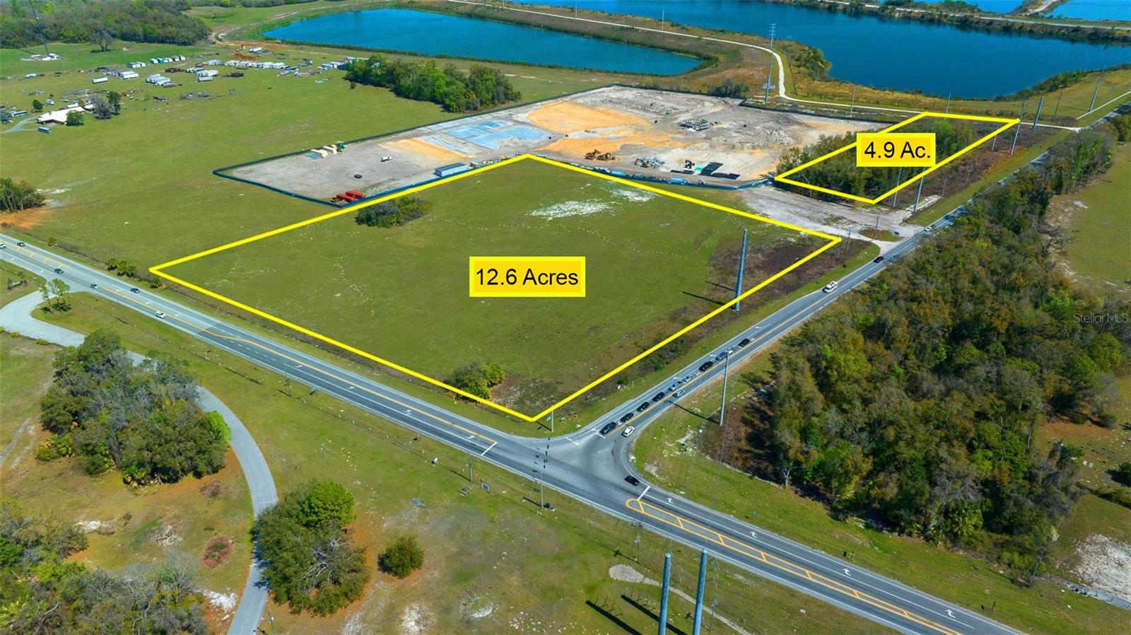 Seize this rare opportunity to acquire a prime parcel of vacant commercial land, ideally located at a signalized hard corner on two major roads, Hwy 301 and Hwy 470, just minutes from the newly expanding town of Middleton, Florida – a vibrant part of The Villages community. 
This strategically positioned 13 acres sits between I-75 and the Florida Turnpike, offering exceptional accessibility and visibility for businesses seeking a high-traffic location.  With utilities to the site, this property is primed for immediate development with Heavy Commercial Land Use. 
The 20 acres abutting the property will be home to the new Sumter County Municipal complex and headquarters including the clerk of the court offices and  new state of the art fire training center. Development is currently underway. 
Situated on Hwy 301, which is set for realignment and widening from Hwy 470 to CR 525E (Industrial Park Drive), makes access and visibility even more desirable for this property. 
Located just 3 mile from Middleton, a community within The Villages, the largest and top selling residential communities in the country. 
Whether you're looking to parcel out for retail, commercial, or mixed-use development, the potential is limitless. Capitalize on the rapid growth of the surrounding area and establish your footprint in one of Florida's most sought-after communities.
Don’t miss out on this once-in-a-lifetime chance to secure a prime commercial location with unparalleled exposure, right in the heart of a bustling, growing area. See adjoining property listed OM696078