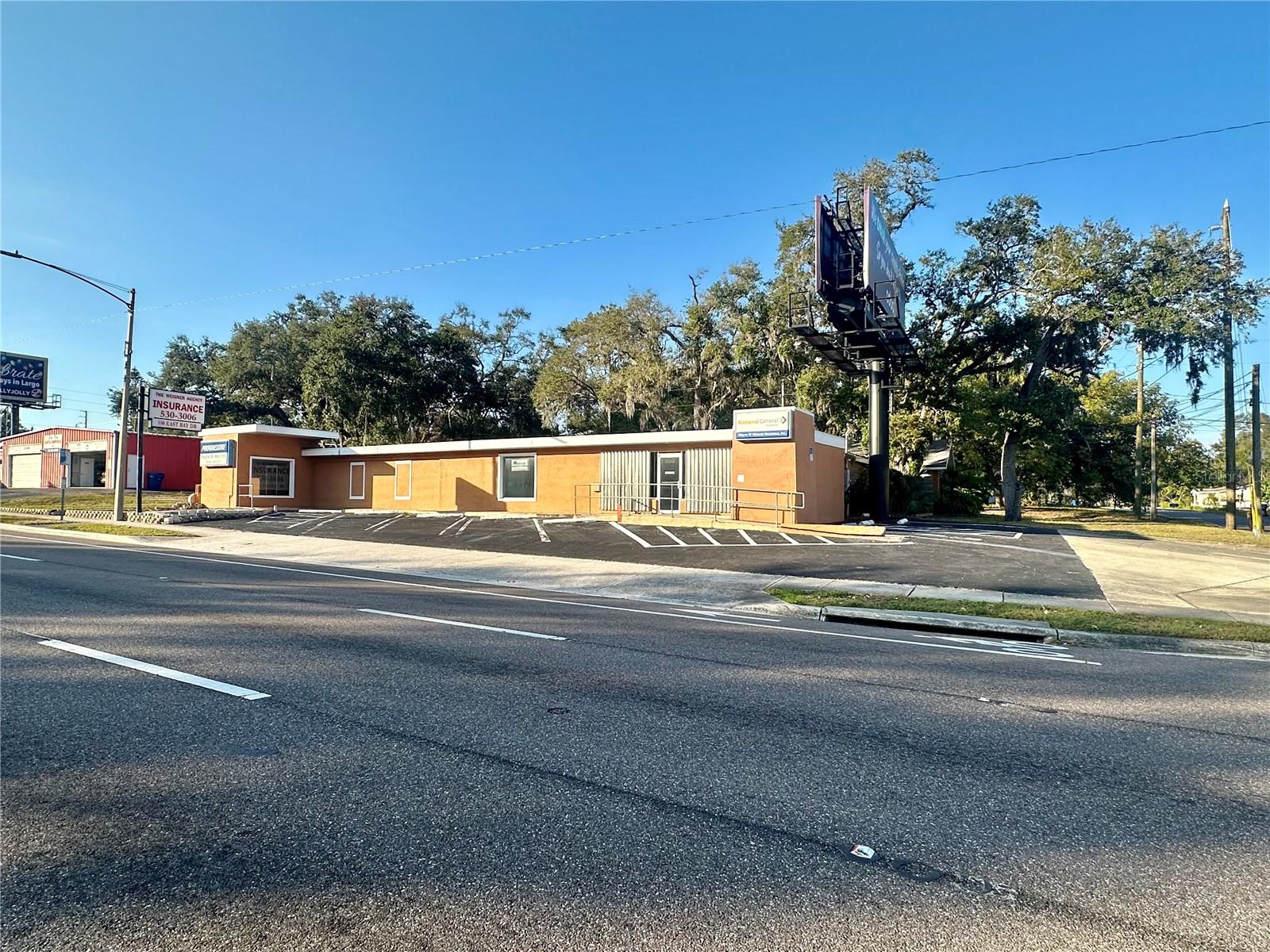 3,212 SF free standing Office Building   -  Highly visible location at corner of East Bay Drive and 6th Street NE  -  .46 acre corner lot with median cut, 165"Ft Frontage on East Bay Drive and 117'Ft depth  -  Former home of long-established Insurance Company  -  8 private offices, reception and office areas, kitchen/break room 3 restrooms and more!  -  Billboard on site with income for property owner  -  Excellent signage and parking  -  Zoning:  CG  General Commercial – City of Largo
Parcel ID:  34-29-15-76536-001-0200  -  Perfect layout for general office, insurance, mortgage or real estate offices  -  Near the Largo Central Park
PRICE IMPROVEMENT:  $790,000.00