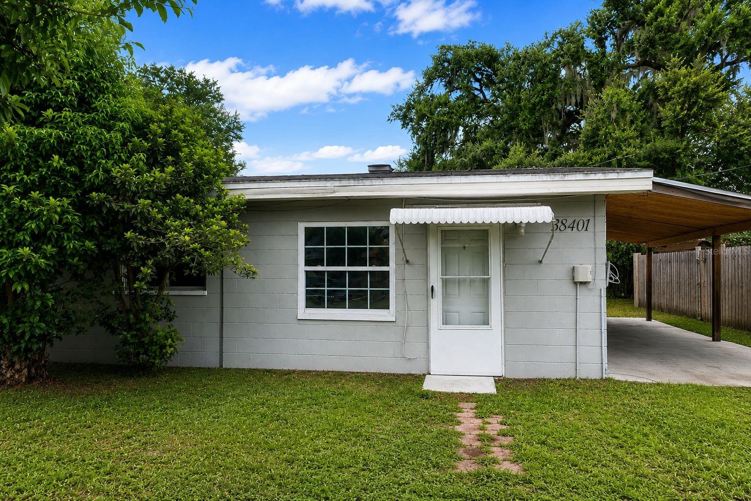 Welcome to this charming 2-bedroom, 1-bath home located in the heart of historic Dade City. This well-maintained residence features an open living and dining area, terrazzo flooring, an inside utility room, and a spacious backyard with plenty of room for outdoor enjoyment. Conveniently located just minutes from downtown Dade City, shopping, dining, parks, schools, and major roadways. Whether you’re a first-time homebuyer, looking to downsize, or searching for an investment opportunity, this property offers exceptional value and potential. No HOA or CDD. Schedule your private showing today!