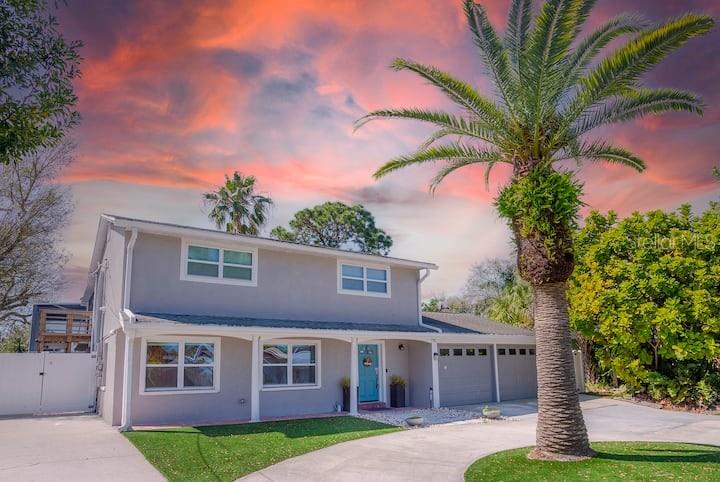 Luxury Smart Waterfront Home | Direct Bay Access | Proven Short-Term Rental | Turnkey Opportunity
Welcome to one of Tampa Shores' premier waterfront homes, where luxury, technology, boating, and investment potential come together in one exceptional property. Completely renovated with high-end finishes throughout, this stunning canal-front residence offers approximately 2,360 heated sq. ft., 4 bedrooms, 3 full bathrooms, and approximately 75 feet of deep-water canal frontage with direct access to Tampa Bay and the Gulf of Mexico. This home has undergone extensive recent upgrades, including a new roof (2021), new Carrier HVAC system (Nov. 2023), new electrical panel (Sept. 2023), a complete smart saltwater pool renovation (2025) featuring a new energy-efficient heat pump, smartphone-controlled automation, automatic water-level filler, and a newly painted pool deck (2026).
Designed with today's buyer in mind, the property features premium smart-home technology including 17 professionally installed commercial-grade 4K security cameras, smart alarm system, enterprise-grade Ubiquiti Wi-Fi with professionally wired access points, smart front door, smart garage door opener, two smart thermostats, and a smart HVAC scent diffuser for a consistently fresh and inviting atmosphere.
The beautifully updated interior offers an open-concept layout with three fully remodeled bathrooms, updated kitchen with newer appliances, smart washer and dryer, elegant tile flooring throughout the first floor, luxury vinyl flooring upstairs, and quality finishes throughout. Step outside into your private waterfront oasis featuring a heated saltwater pool, spacious entertaining areas, private dock, covered boat lift, and spectacular canal views. Residents also enjoy access to the community's private boat ramp, making boating effortless.
Professionally installed premium artificial turf enhances the front, side, and backyard, providing beautiful year-round curb appeal with virtually no maintenance. Nestled within the exclusive Tampa Shores waterfront community of approximately 260 homes, this boater’s paradise offers direct access to Tampa Bay and the Gulf of Mexico with no bridges or locks. Spend your evenings relaxing by the pool or watching dolphins and manatees from your private dock as the sun sets over the canal.

Currently operating as a successful short-term vacation rental (7-day minimum local regulations), this property comfortably sleeps up to 12 guests and has established strong rental income with outstanding guest satisfaction. Whether you're seeking a luxury primary residence, second home, or income-producing investment, this property delivers exceptional versatility. Premium furnishings, décor, and guest amenities are negotiable, providing the opportunity for a truly turnkey investment.

Additional highlights include a spacious circular driveway with ample parking, no HOA, and an unbeatable location just minutes from Tampa International Airport, Downtown Tampa, International Plaza, Raymond James Stadium, and many fine dining restaurants and very close to Target super store, Publix and Walmart groceries  

Whether you're looking for a luxurious waterfront lifestyle, a boater's paradise, or a proven income-producing property, this one-of-a-kind home offers it all.

Luxury. Waterfront. Technology. Income Potential. Welcome Home.