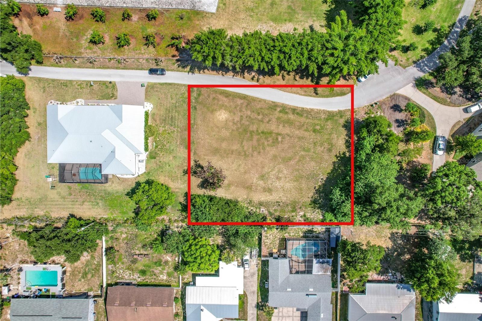 Build your dream home on one of Winter Haven's most exclusive and private streets. Tucked away on prestigious Brogden Court SE, on nearly an acre of land, this exceptional vacant homesite offers a rare opportunity to create a custom residence in a secluded setting while remaining remarkably close to everything Central Florida has to offer.

Enjoy the perfect balance of privacy and convenience with easy access to Winter Haven's vibrant and growing downtown district featuring waterfront dining, local boutiques, coffee shops, entertainment venues, and year-round community events. Everyday essentials are just minutes away--including grocery stores, shopping centers, medical facilities, and highly regarded recreational amenities.

Commuters will appreciate the property's central location with convenient access to major transportation corridors connecting Orlando, Tampa, Lakeland, and surrounding employment centers. World-famous attractions including Walt Disney World, Universal Orlando Resort, LEGOLAND Florida Resort, Orlando International Airport, Gulf Coast beaches, and Atlantic Coast destinations are all within reach for work, travel, or weekend adventures.

Whether you're envisioning a luxury estate, a private retreat, or your forever home, this unique homesite offers the opportunity to build exactly what you want in one of Winter Haven's most desirable and established locations.

Don't miss your chance to secure one of the area's most exceptional and rare vacant parcels to bring your vision to life.