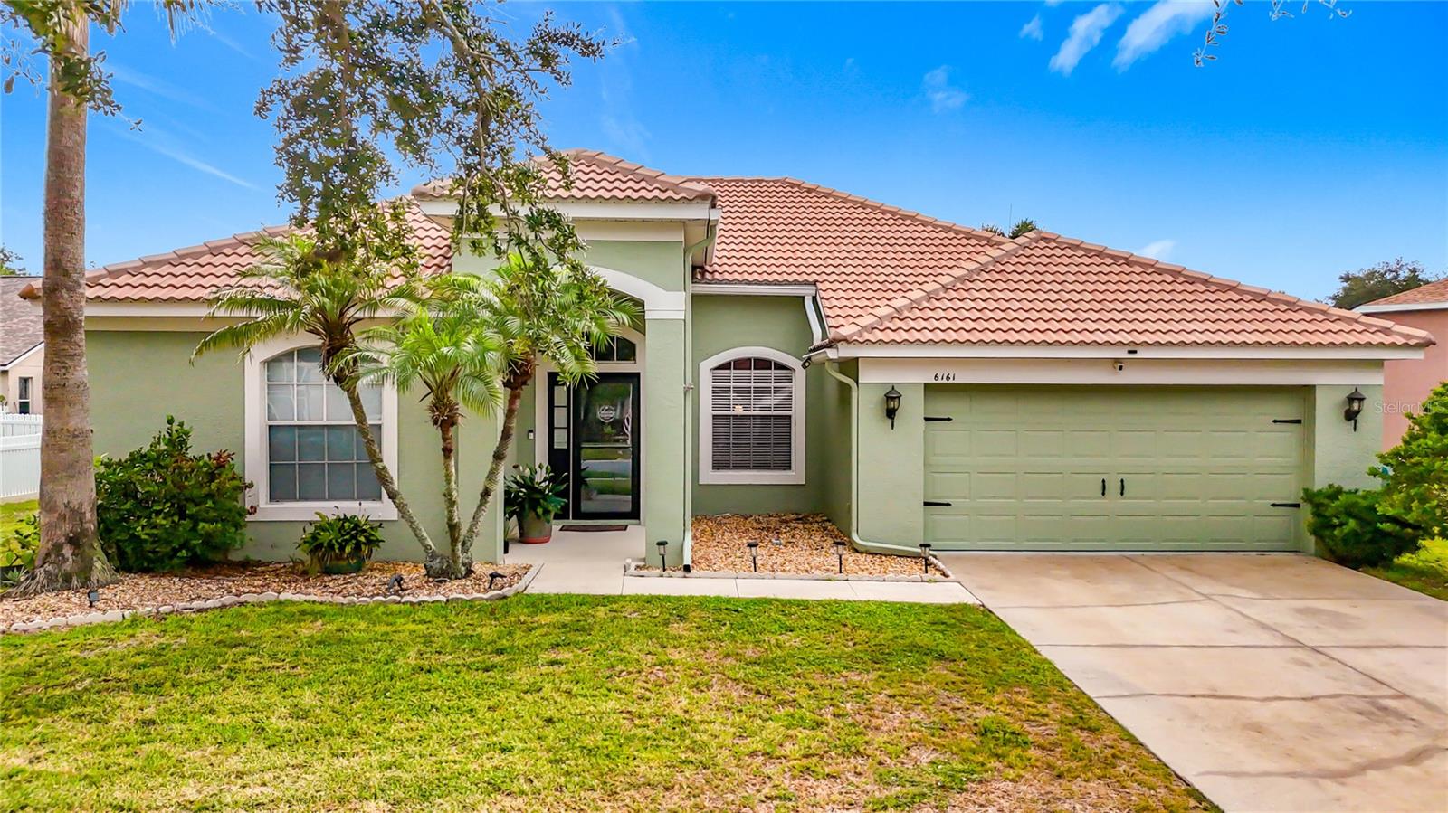 This thoughtfully designed Ryland-built St. Augustine floor-plan, provides a comfortable, functional living space with a layout that blends open-concept gathering areas and well-defined private spaces. The golf community home includes 3 bedrooms in a split plan and 2 full bathrooms. The generous screened lanai measures 40 x 27 and includes a solar heated, saltwater pool. Access to the lanai/pool area is possible via patio doors located in the family room, dining room and master suite. The large kitchen has a breakfast bar, island, LG brand stainless steel appliances, beautiful granite counter-tops and 42" wood cabinetry. The large master suite includes 2 walk-in closets and a recently remodeled master bath with a large walk-in shower. The secondary bath, located off the family room and between the 2 other bedrooms has also recently had a walk-in shower installed. The Fairways at Imperial Lakewoods is a NO CDD community and has low semi-annual HOA dues. The community is located adjacent to the Moccasin Wallow (The Moc) golf course where many residents take advantage of membership opportunities. The Gateway Commons Publix is located just outside the neighborhood entrance, and a 4-acre Lagoon/Waterpark is under construction approximately 1 mile away. The home has a hookup for backup generator support and a 13K generator capable of supporting critical household functions (A/C, refrigerator, freezer, lights, Internet, TV, etc) can be included in the purchase. Natural gas is available in the neighborhood and an order to install a meter to support the generator has been submitted. The home comes with Kevlar style hurricane covers including 2 permanently mounted electric screens to completely enclose the covered patio area adjacent to the patio doors.