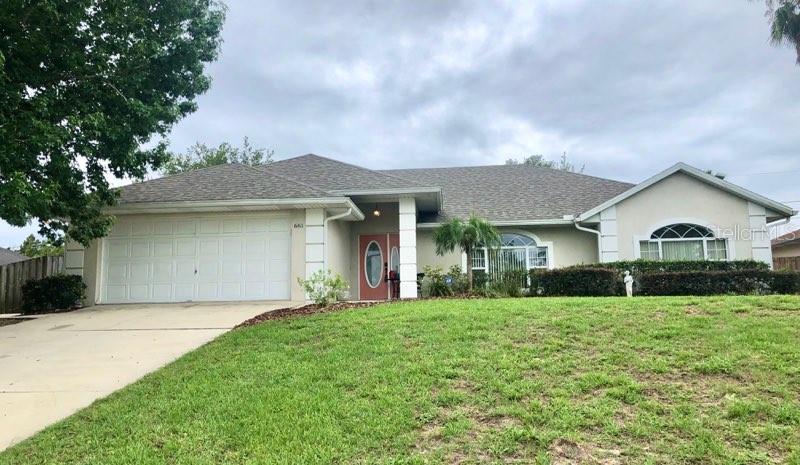 Beautiful 3 bedroom, 2 bathroom, 2 car garage inground pool home. Home is high and dry with mature landscaping in established neighborhood. Split floor plan with vaulted ceilings throughout makes the home even more spacious. Formal living room in front of home connects to the dining room with slider and view of the pool. Kitchen is open to family room, features new neutral granite counters, white cabinetry and stainless appliances. Breakfast nook has a view of the pool and slider to the screened lanai recently resurfaced with pavers. Fenced backyard features the open pool and spa (not heated). Paver area for sunning or firepit. Master bedroom features his/hers closets, garden tub, walk in shower, double sinks and door to the lanai and pool. Guest bathroom offers tub/shower combo. New roof July 2017, new carpet in living area and bedroom April 2020, Granite in kitchen May 2020, pool and spa 2002, water heater 2015, A/c Jan 2016. The pool is equipped for Salt Water but needs new salt cell - currently running with Chlorine, spa plumbed for heater- currently no heater installed. ;Water: City