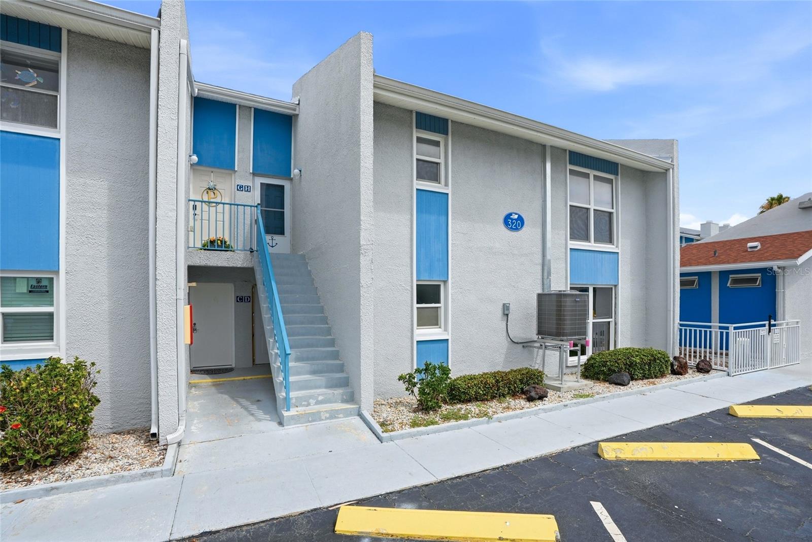 Madeira Beach Yacht Club – Coastal Living Meets Incredible Investment Potential! Welcome to this light and bright 2-bedroom, 1-bath second-floor condo in the highly sought-after Madeira Beach Yacht Club community. Turnkey furnished and move-in ready, this inviting condo features updated windows, a new AC installed in 2025, and the convenience of inside laundry. Ideally located near one of the community's two pools, it's ready for immediate enjoyment, seasonal use, or rental income.  Situated along the beautiful Intracoastal Waterway, Madeira Beach Yacht Club offers an unbeatable Florida lifestyle with fishing docks, stunning waterfront walking trails, and a clubhouse currently undergoing renovation. Best of all, you're just a short stroll from the sugar sands of Madeira Beach, as well as local dining, shopping, and entertainment.  Investors and second-home buyers will appreciate the flexibility of this all-ages community, where 7-day rentals are permitted, creating exceptional opportunities for vacation rental income and strong return on investment.  Enjoy easy access to nearby ROC Park, featuring pickleball courts, tennis courts, basketball courts, playgrounds, and scenic waterfront recreation areas.  An added bonus: the monthly maintenance fee covers nearly everything except electric, providing exceptional value and hassle-free ownership.  Don't miss this opportunity to own in a community that is actively investing in its future, with ongoing upgrades and enhancements following the recent storms that continue to add value and appeal for owners and guests alike.  Whether you're searching for a full-time residence, a turnkey beach retreat, or a high-demand investment property, this condo offers the perfect blend of location, lifestyle, and opportunity. Live the Madeira Beach dream while enjoying the flexibility, amenities, and income potential that make this community one of the area's most desirable waterfront destinations.