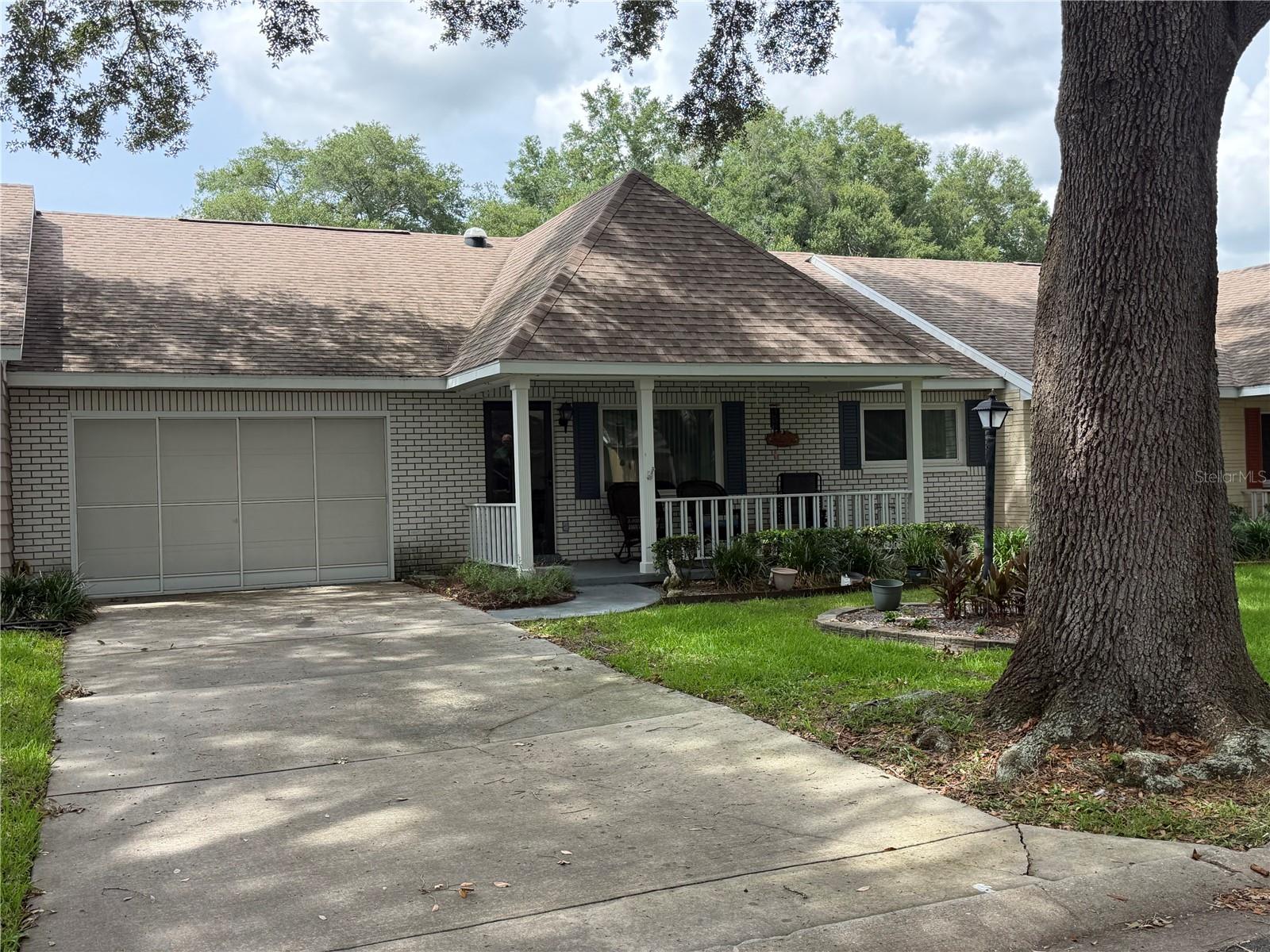 Discover over 1,300 sq. ft. of comfortable living on a peaceful, tree-canopied street. This well-kept villa is clean and move-in ready. The roof was replaced in 2021. The A/C is 2012. The garage is actually considered 1.5. This villa includes a Club Car golf cart that has lithium batteries just over a year old. Don't miss this great value. Set up your showing today.