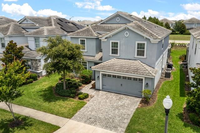 This magnificent two-story, fully furnished single-family home is zoned for short-term rental and offers exceptional space for you and your family. With six bedrooms, six bathrooms and a two-car garage, the layout is designed for both comfort and entertainment. The elegant master bedroom, located on the second floor, features a private bath complete with a soaking tub, separate shower and dual sinks. Additional living spaces—including a loft, a game room and a family room—provide plenty of room for relaxation and fun.

The home is appointed with 42-inch maple cabinetry, quartz countertops in both the kitchen and bathrooms, and stainless steel appliances, creating a stylish and functional environment throughout. Outside the home, you’ll enjoy access to an impressive array of resort-style amenities, including a pool, spa, basketball courts, fitness center, on-site concierge and more. ChampionsGate Resort, The Oasis Club and the surrounding park areas offer a lazy river, waterslides, a swim-up bar, waterfalls, beach-entry pool, spa, splash pad, grill, bar, fitness area, theater, game room, tiki bar and cabanas. Seven tennis courts are also included as part of the HOA amenities. Whether you’re relaxing by the pool or enjoying the many activities available, this home provides the perfect setting for unforgettable moments with family and guests.